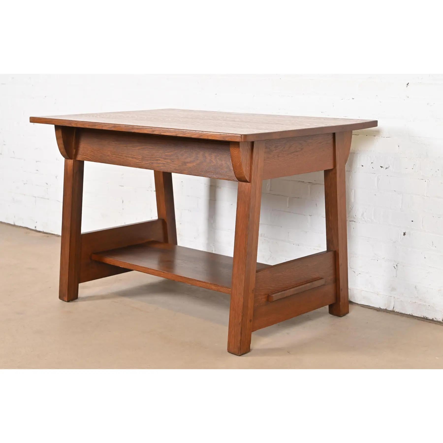 An exceptional antique Mission or Arts & Crafts period library table or writing desk

By Charles P. Limbert Co.

USA, Circa 1910

Measures: 44