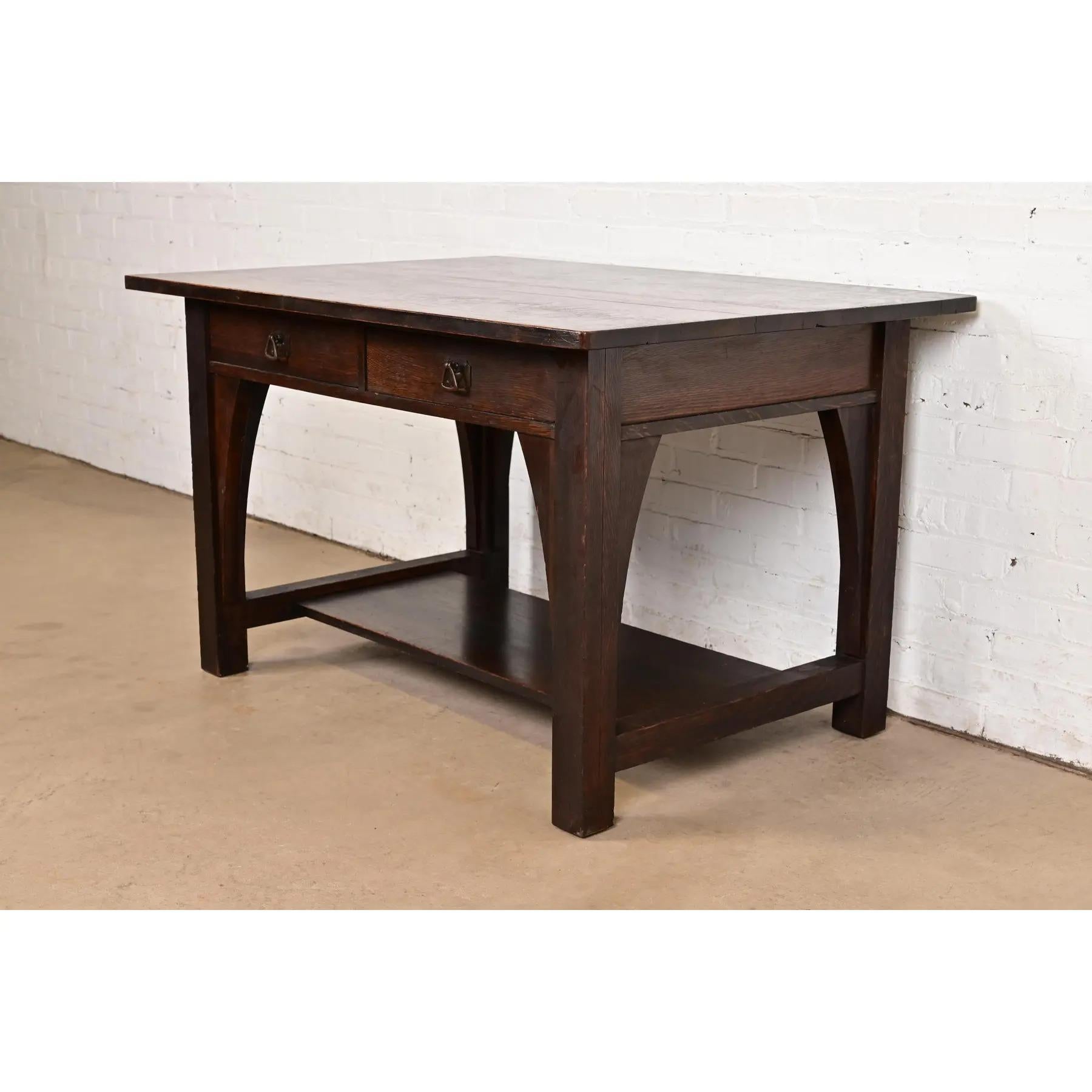 An exceptional antique Mission or Arts & Crafts period library table or writing desk

By Charles P. Limbert Co.

USA, Circa 1910

Quarter sawn oak, with original hammered copper hardware.

Measures: 48