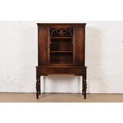 Limbert English Jacobean Carved Walnut Bookcase or Bar Cabinet, Circa 1920s
