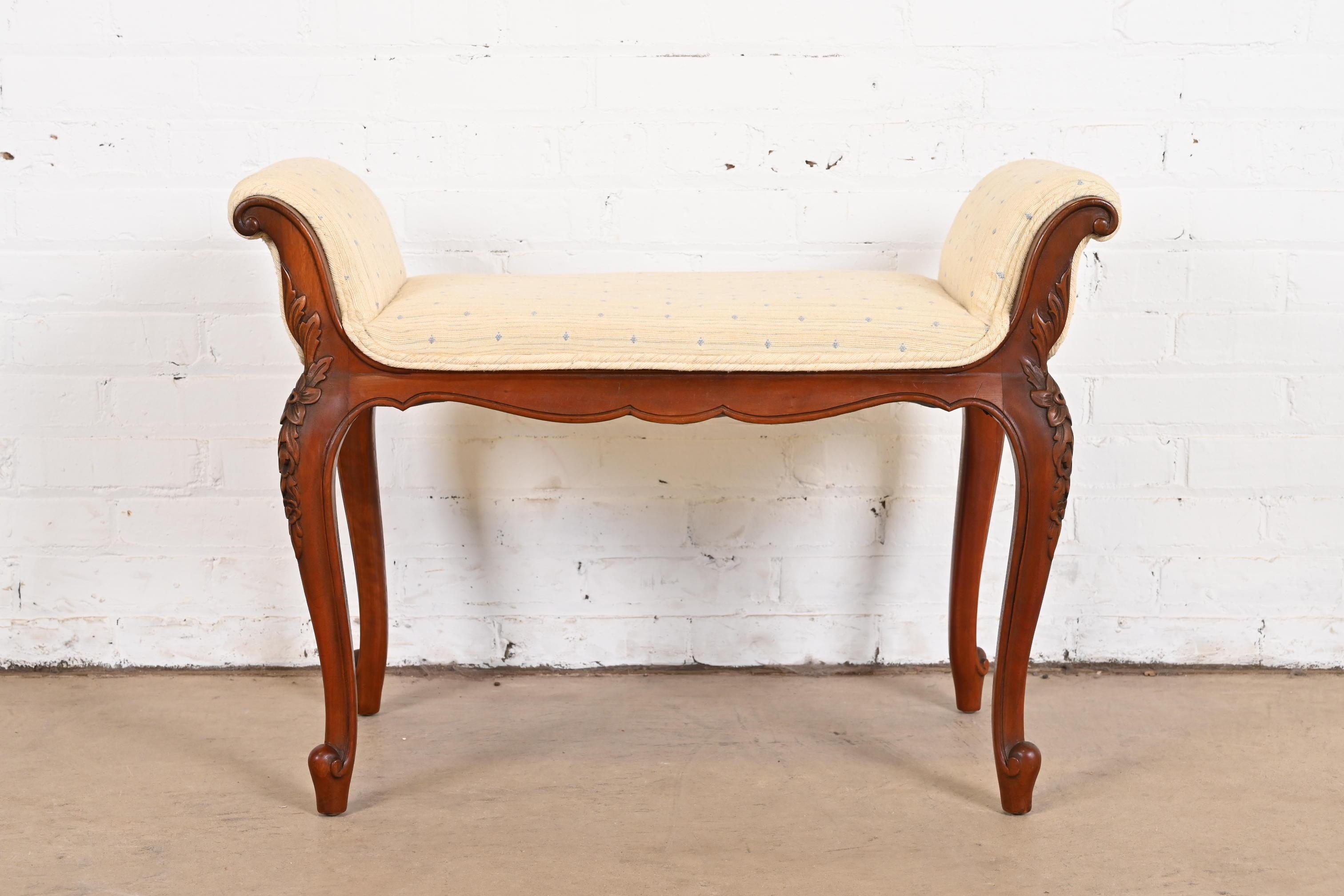 A gorgeous French Provincial Louis XV style vanity bench

By Limbert

USA, 1920s

Carved solid rosewood, with upholstered seat.

Measures: 31.5