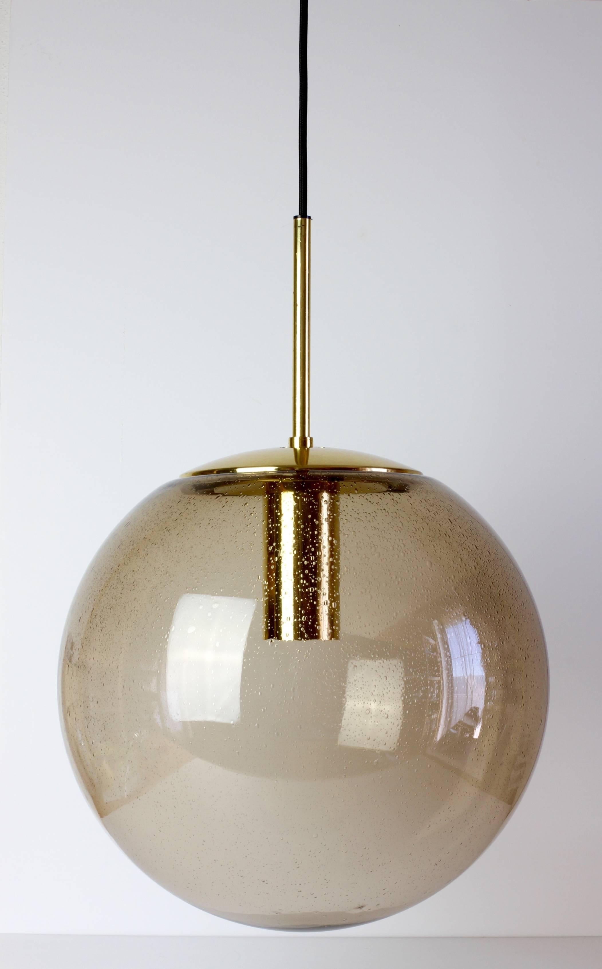 Mid-Century Modern Limburg 1 of 3 Vintage 1970s Round Smoked Glass & Brass Globe Pendant Lights For Sale