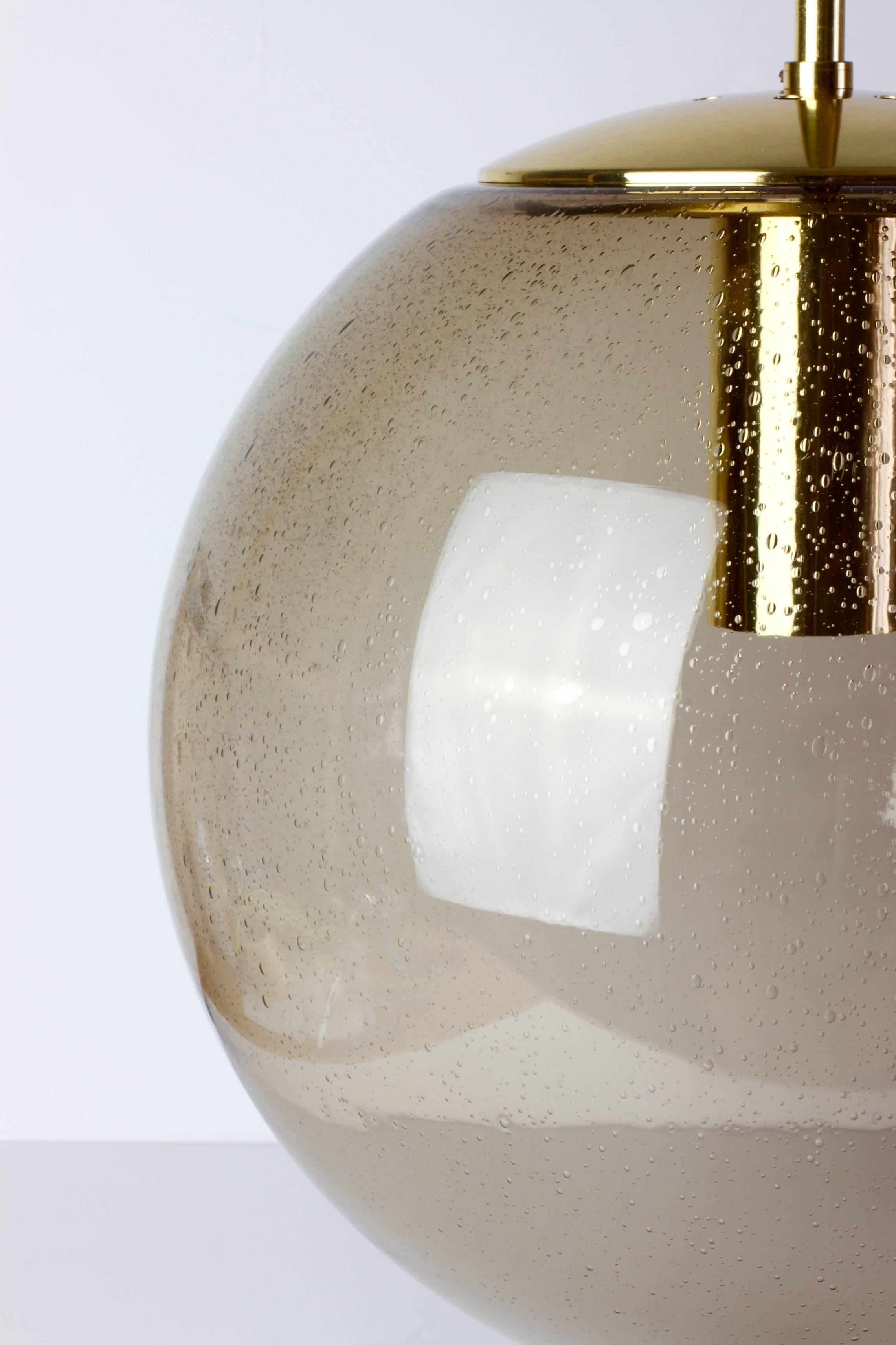 German Limburg 1 of 3 Vintage 1970s Round Smoked Glass & Brass Globe Pendant Lights For Sale