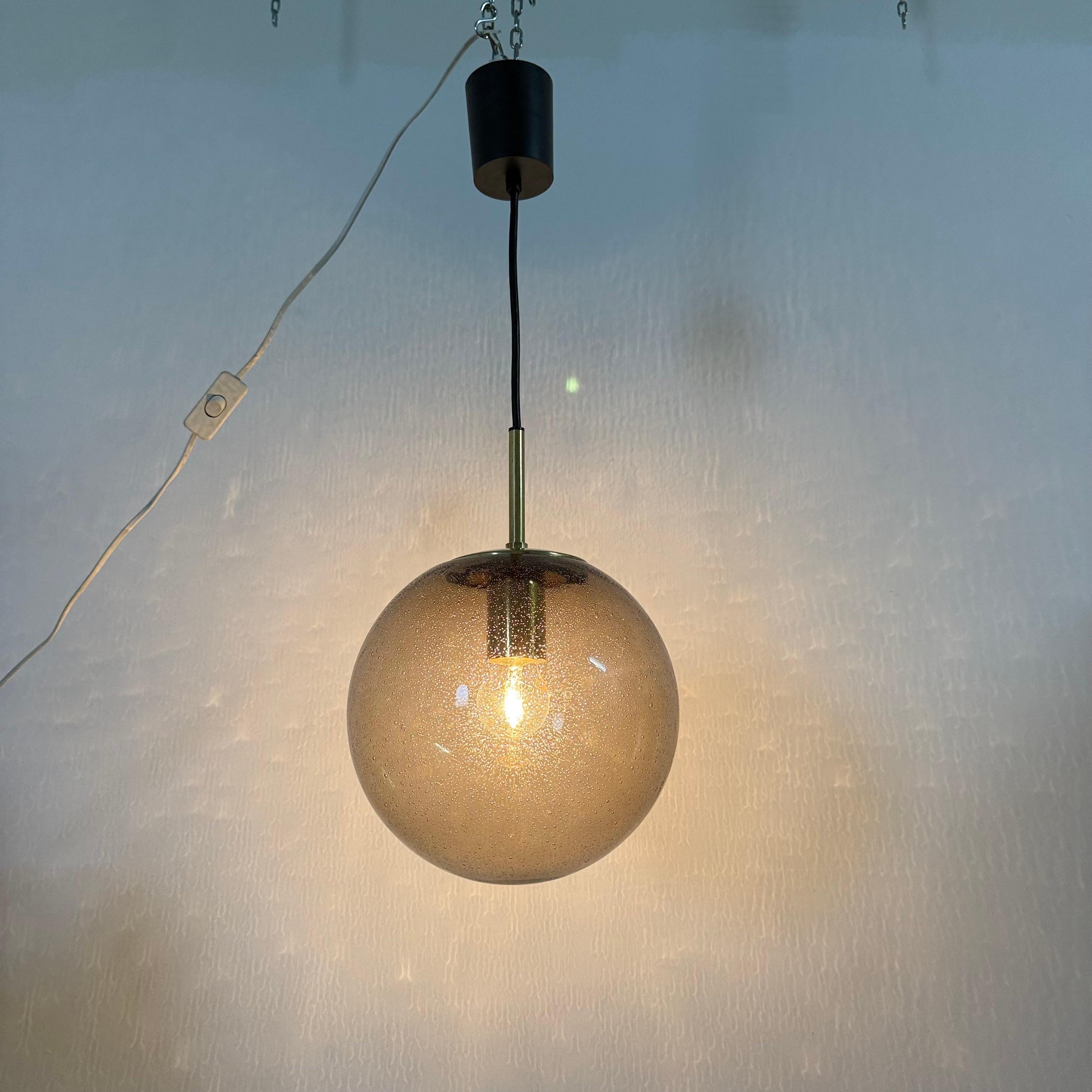 Fine XX secolo Limburg Glashütte brass smoked glass ball pendant hanging lamp , 1970s in vendita