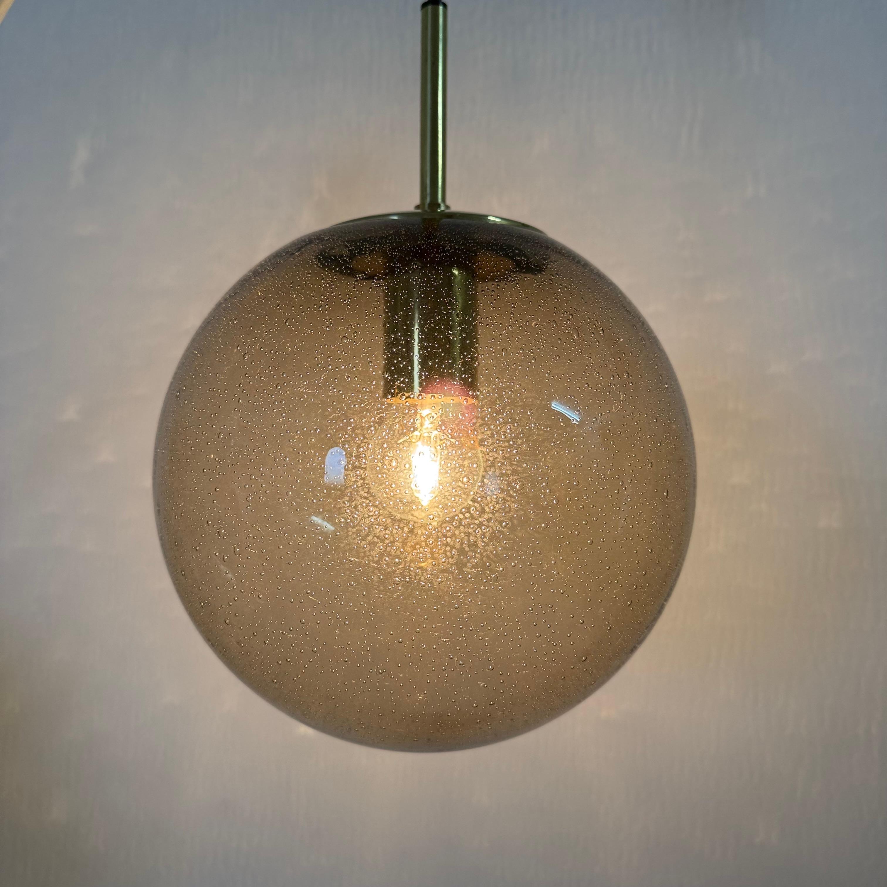 Vetro Limburg Glashütte brass smoked glass ball pendant hanging lamp , 1970s in vendita