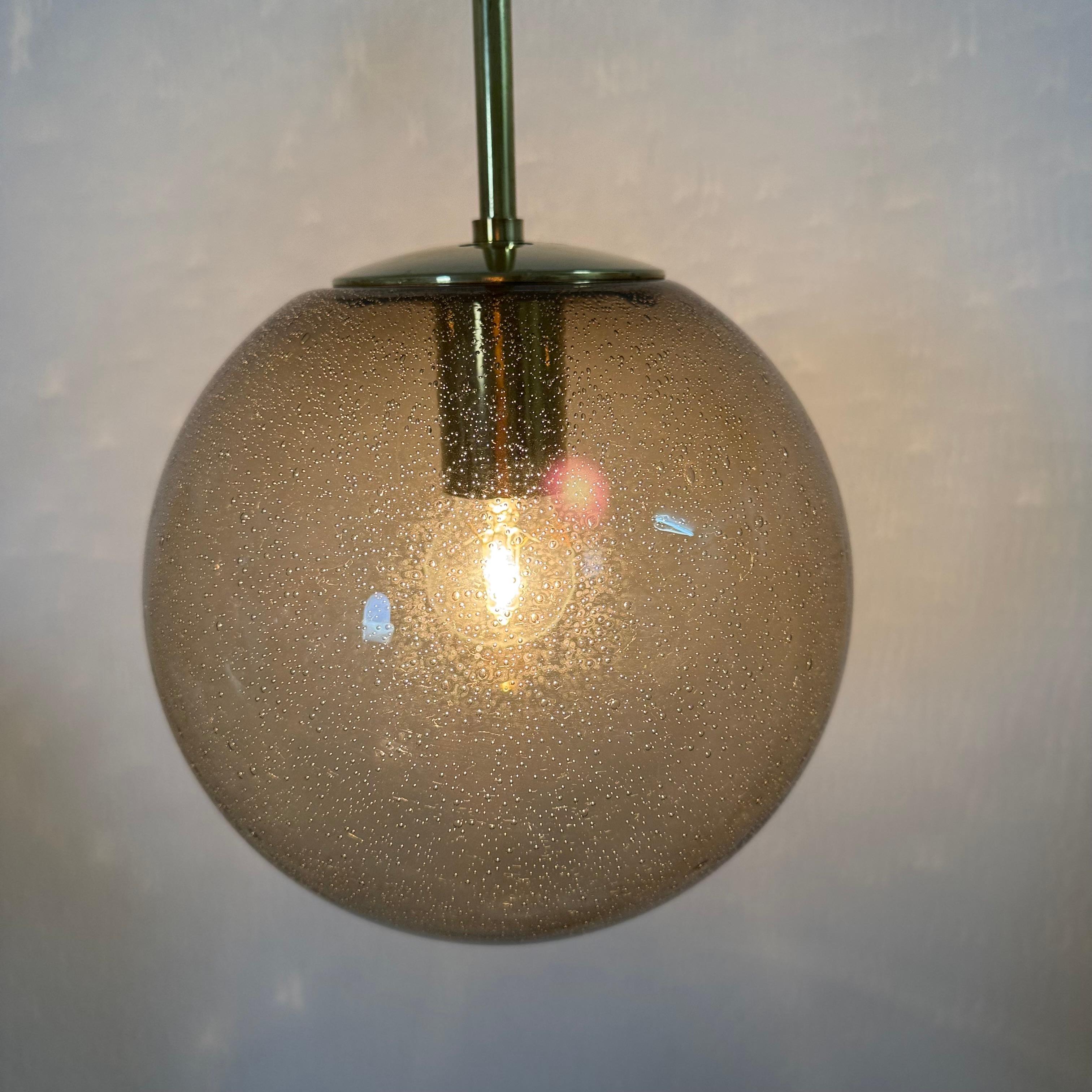 Limburg Glashütte brass smoked glass ball pendant hanging lamp , 1970s in vendita 1