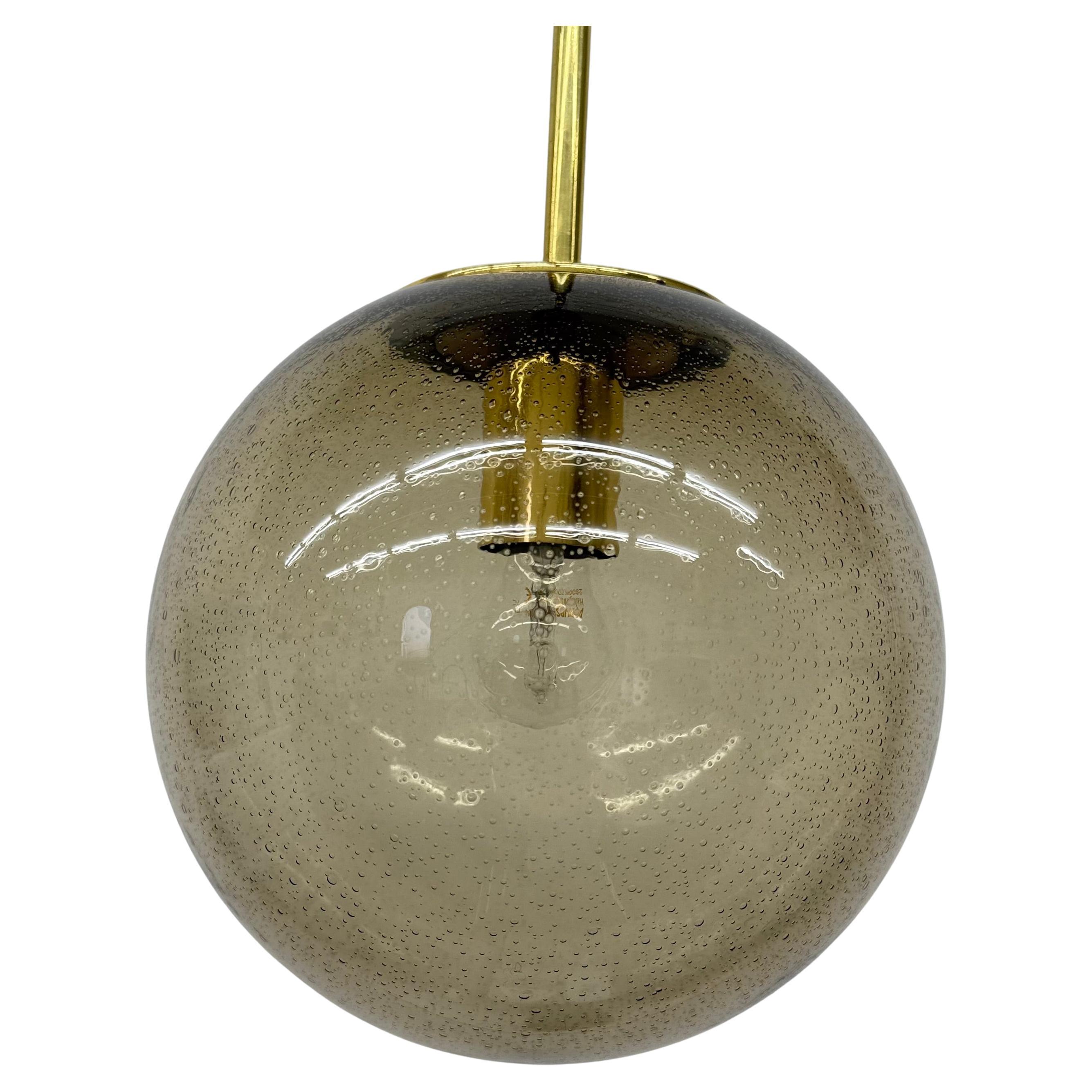 Limburg Glashütte brass smoked glass ball pendant hanging lamp , 1970s in vendita