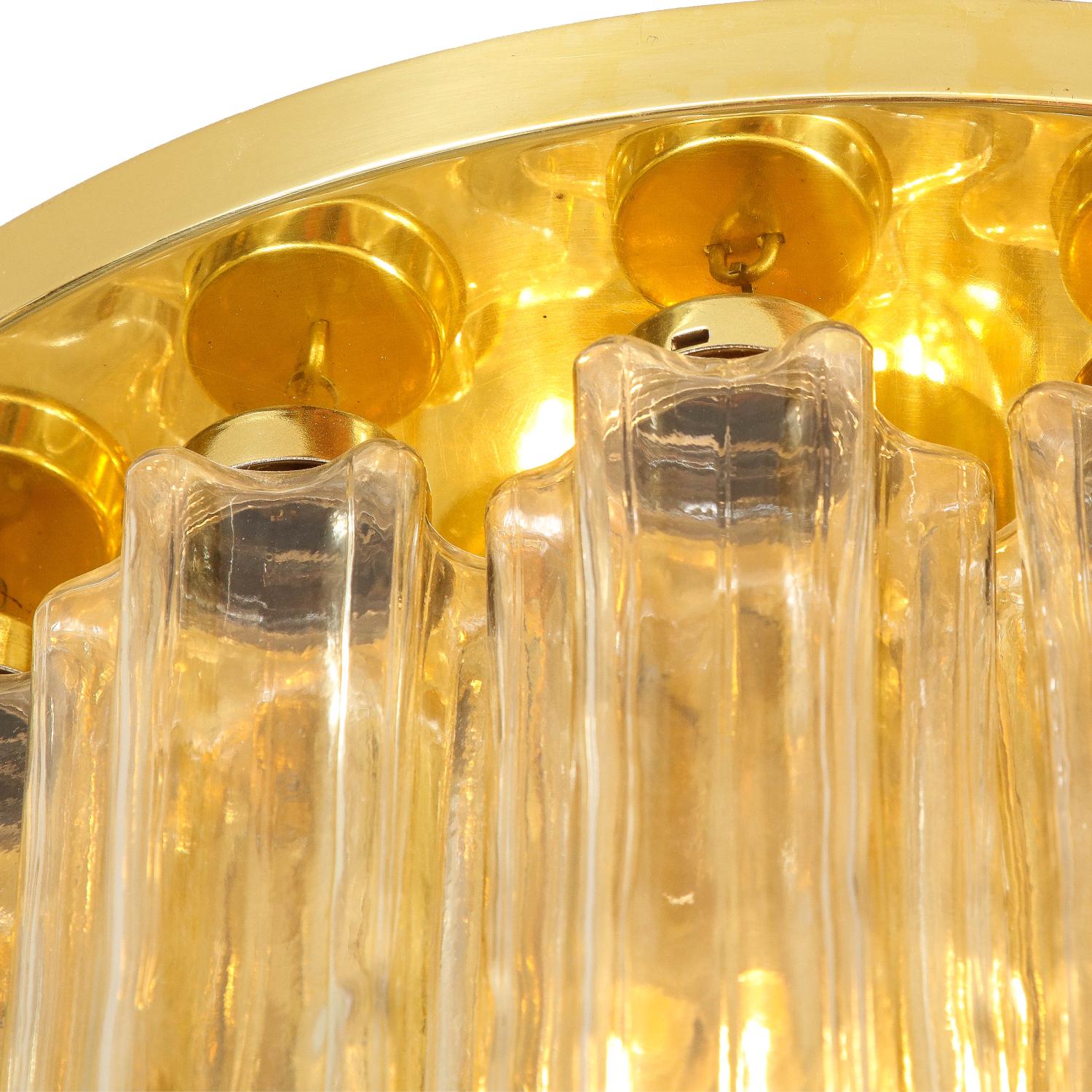 Elegant flush mount chandelier with polished brass frame and star-shaped tubular glass by Limburg Glasshütte, Germany 1960s. Wear consistent with time and use.