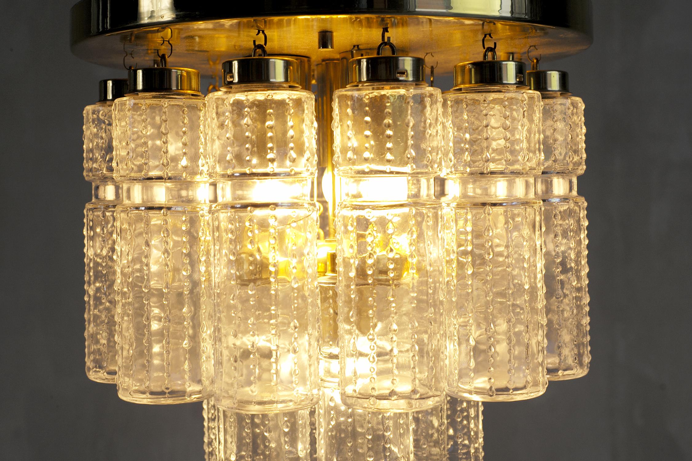 Set of 3 ceiling lights in gilded brass and glass produced by Maison Limburg, Germany 1960. A ceiling light has 4 lights and 18 glass cylinders in 2 rows, the other two have a light and 6 glass cylinders. Ideal for a hallway, stairway or bedroom,