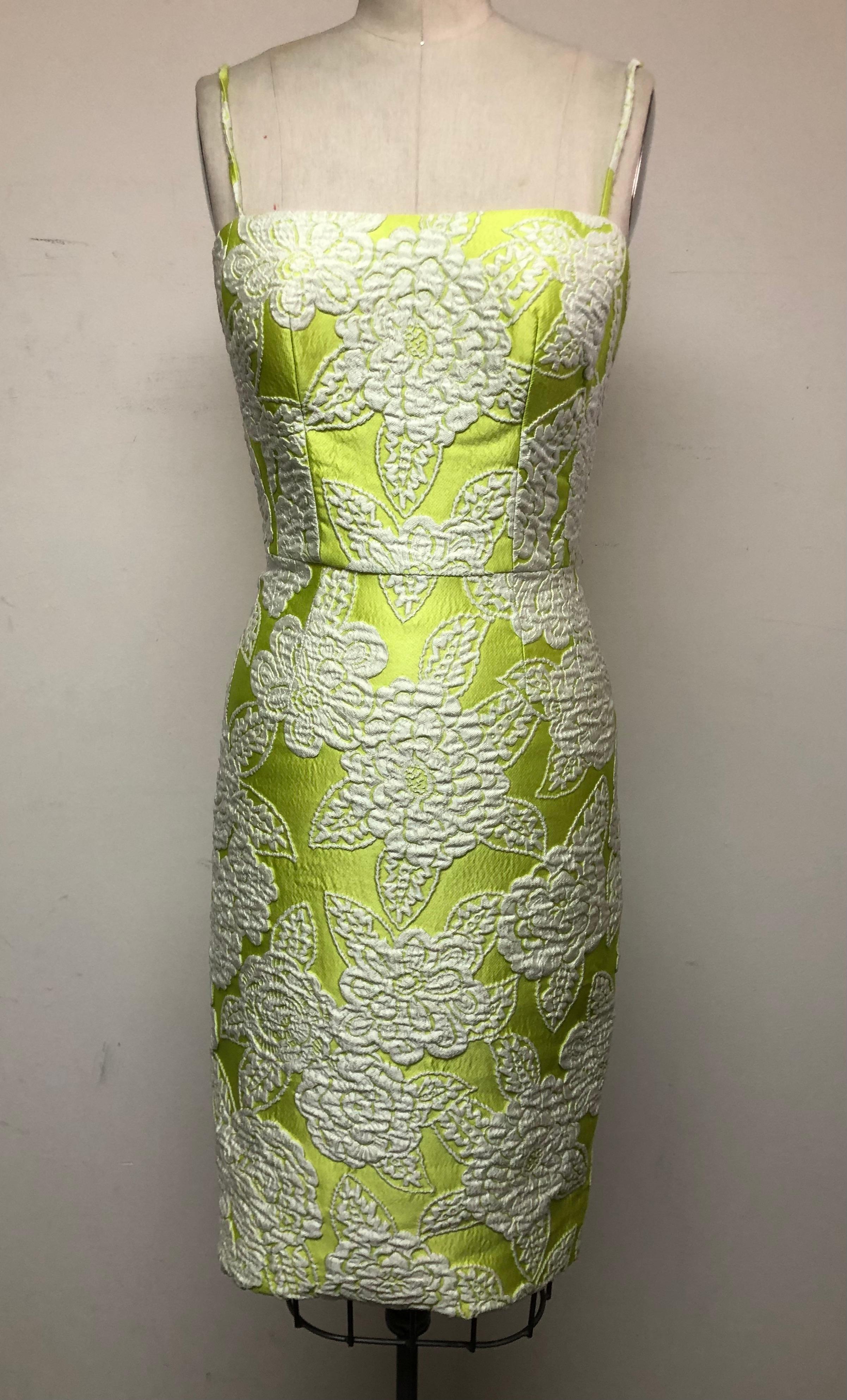 Charming Summer frock for winter or summer escapes. Lime green with white textured imported fabric gives this lovely dress a unique and lux feel. The color combination is fresh and exciting. Built in cups and bones for maximum bodice comfort and