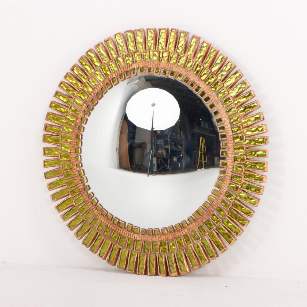 This large lime textured glass and resin convex mirror is in a 