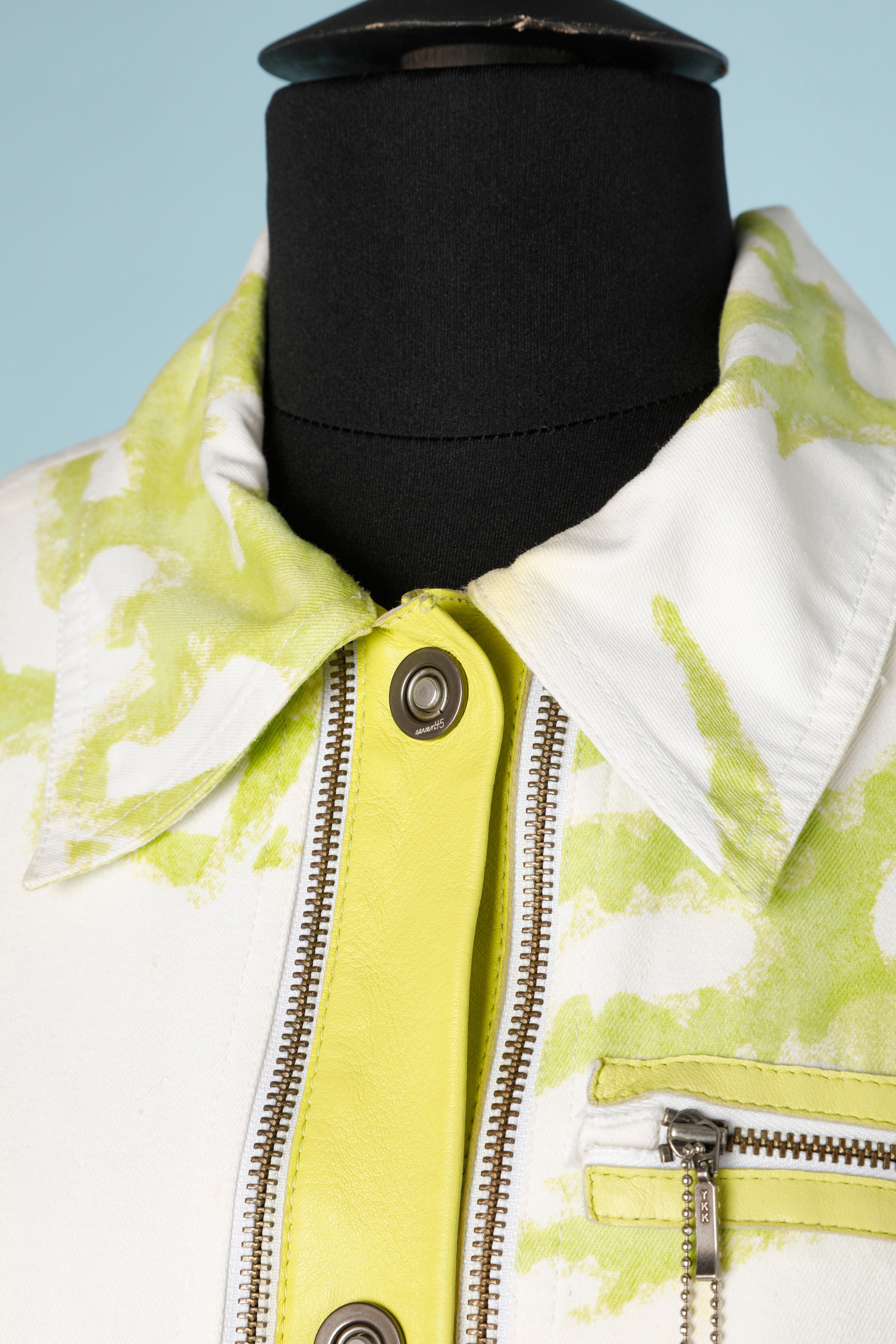 Veste taÏ&daÏ vert citron et blanc avec double fermeture à glissière sur la patte de boutonnage avant, sur la poitrine et sur le bord des manches. 
TAILLE 38 ( Fr) 