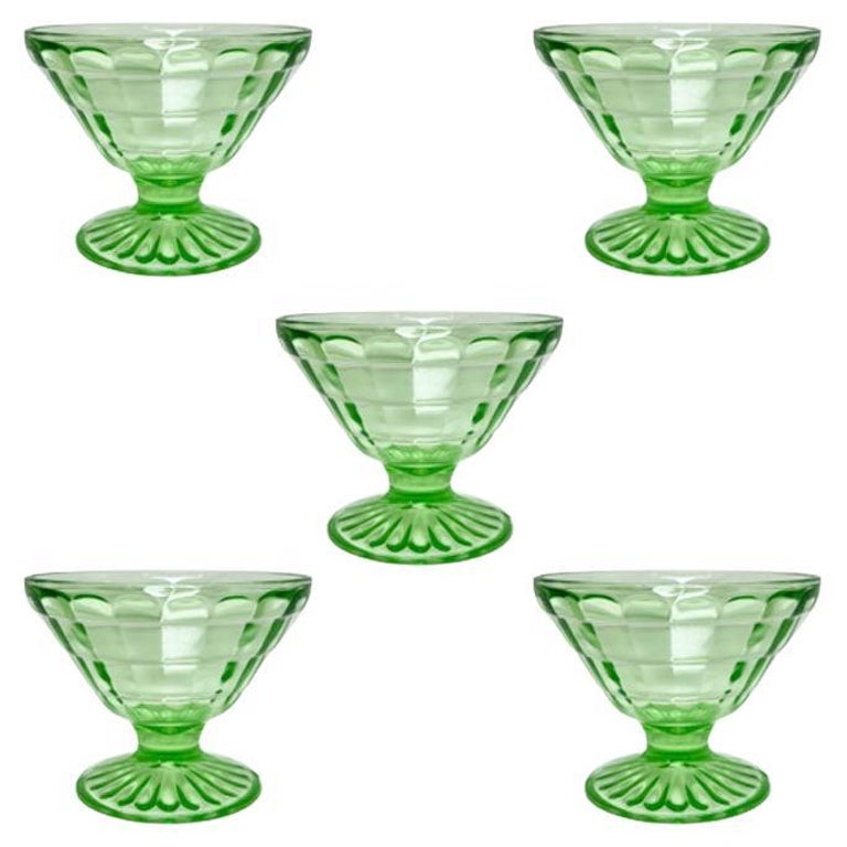 https://a.1stdibscdn.com/lime-green-vaseline-glass-or-depression-glass-champagne-coupe-glasses-set-of-5-for-sale/f_33823/f_361127721694459714488/f_36112772_1694459714748_bg_processed.jpg?width=768
