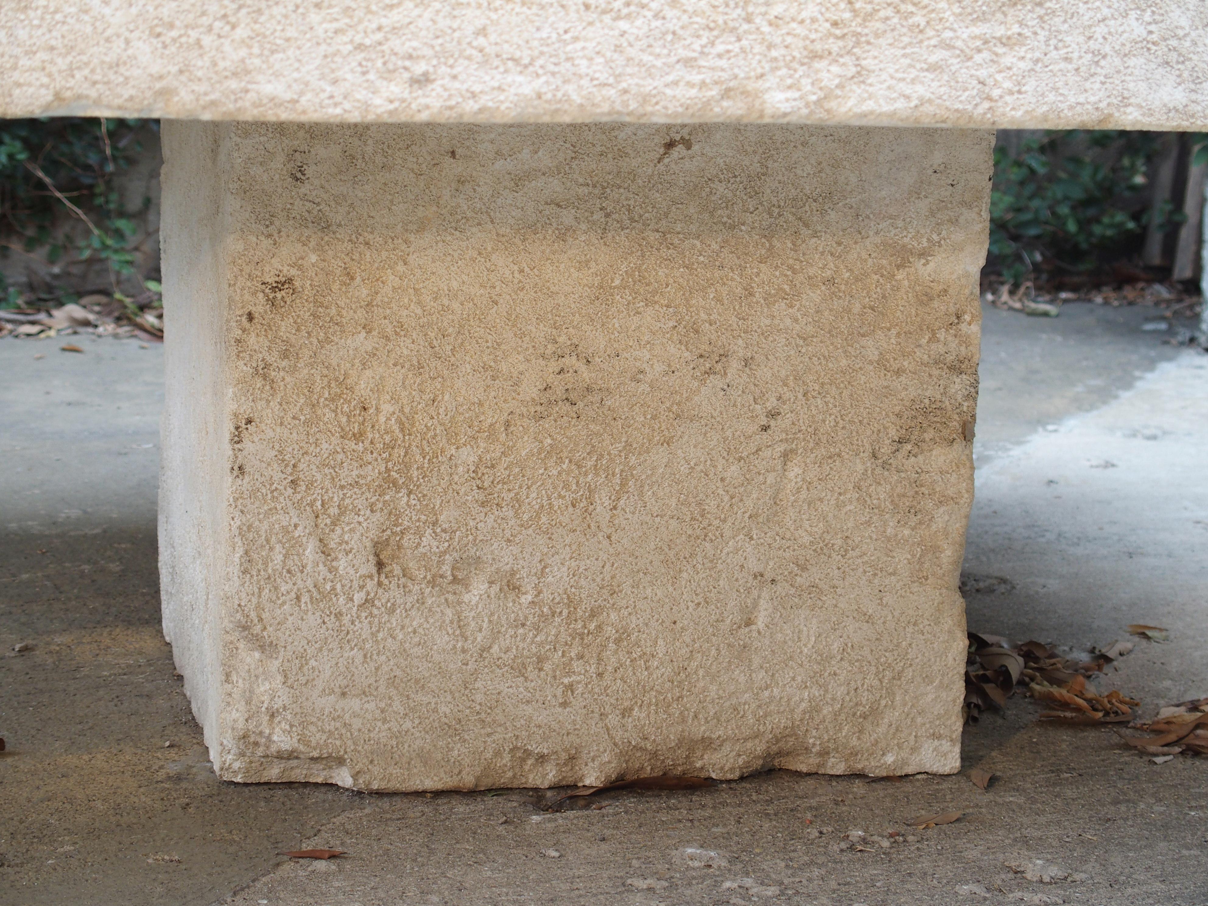 This versatile, large coffee table from the South of France has been carved from the famous Estaillade stone of Provence. The top slab is made from one thick piece of limestone, and the base also made from one big block. This table can be used with