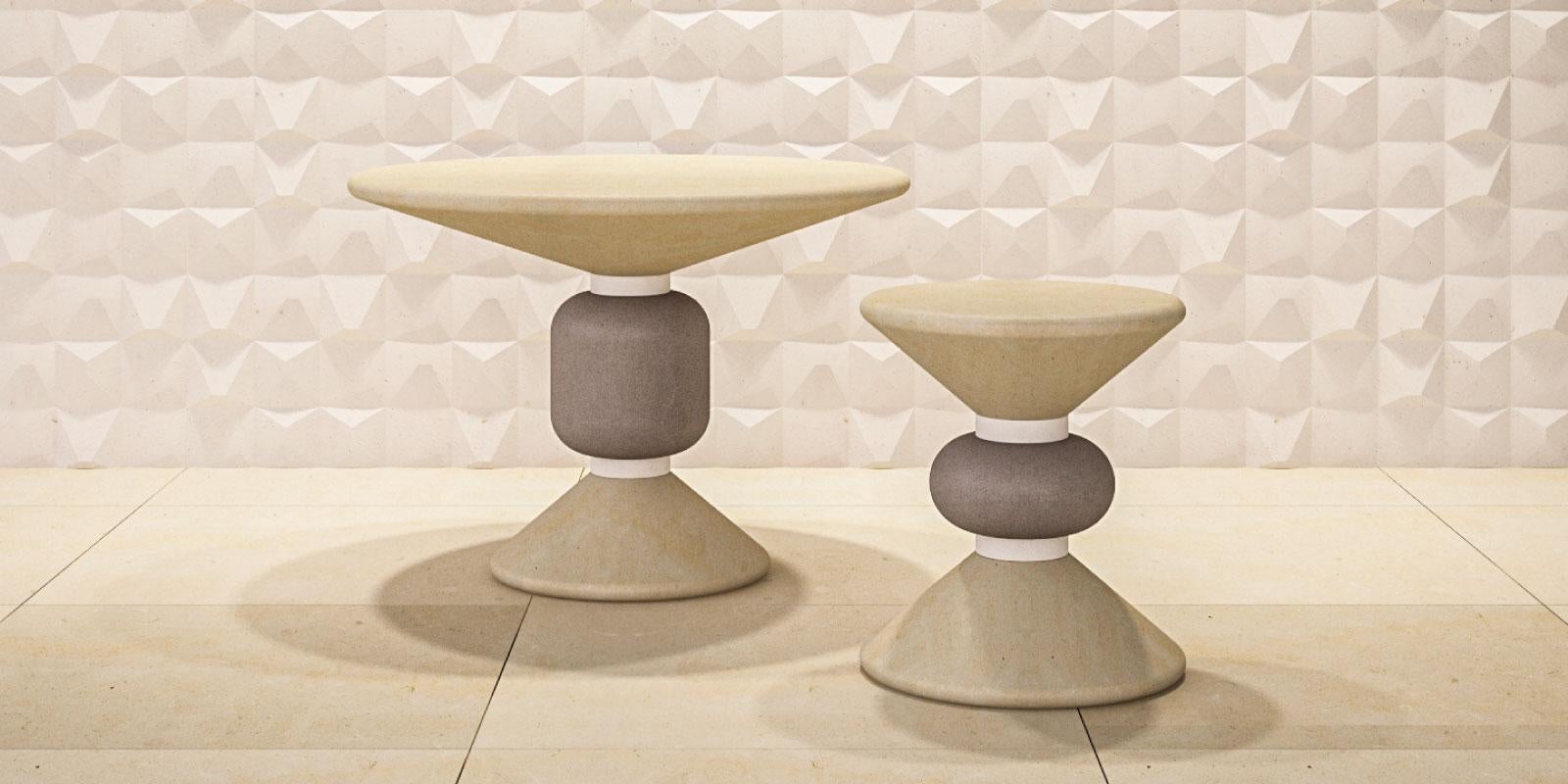 A pair of sculptural beige and grey tables crafted of Lime stone.
Suitable for both indoor and outdoor environments.
Large: ø 27.5