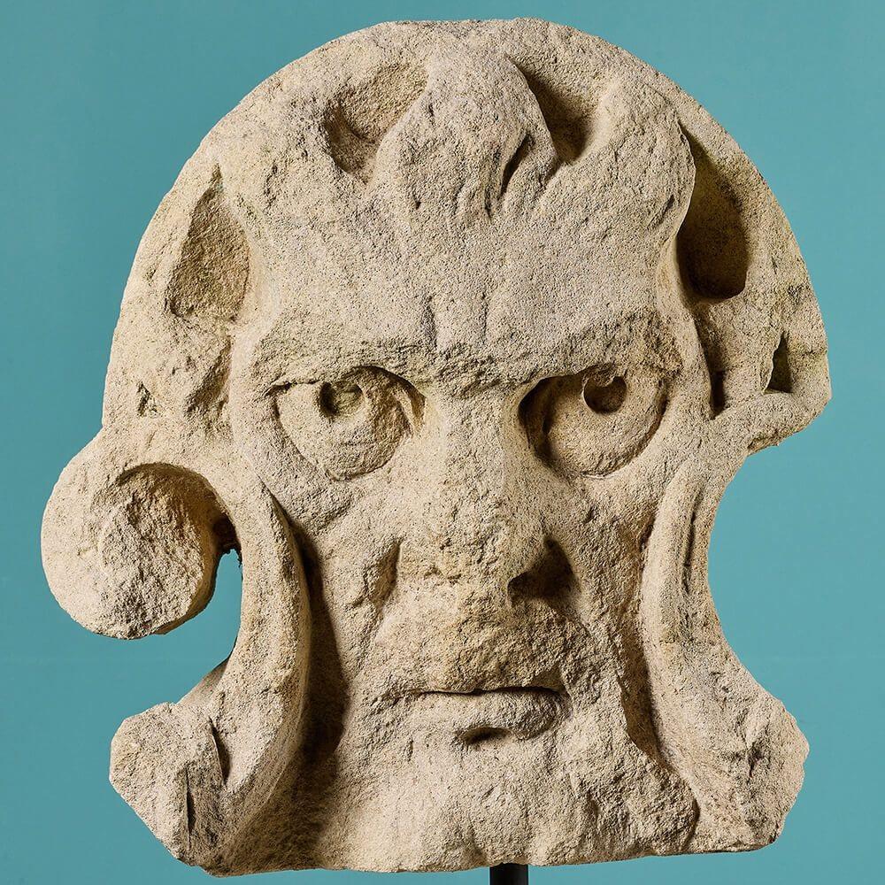 Neoclassical Limestone Demonic Mask or Grotesque Statue For Sale
