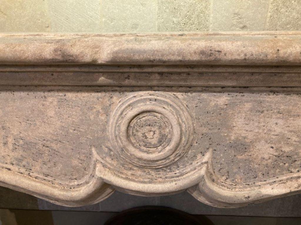 Charming limestone fireplace mantel dating from the beginning of the 19th century.
Inside dimensions : 112cm wide x 84cm high