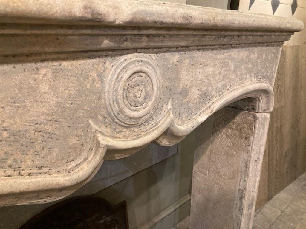French Limestone Fireplace Mantel, dating from the Beginning of the 19th Century For Sale