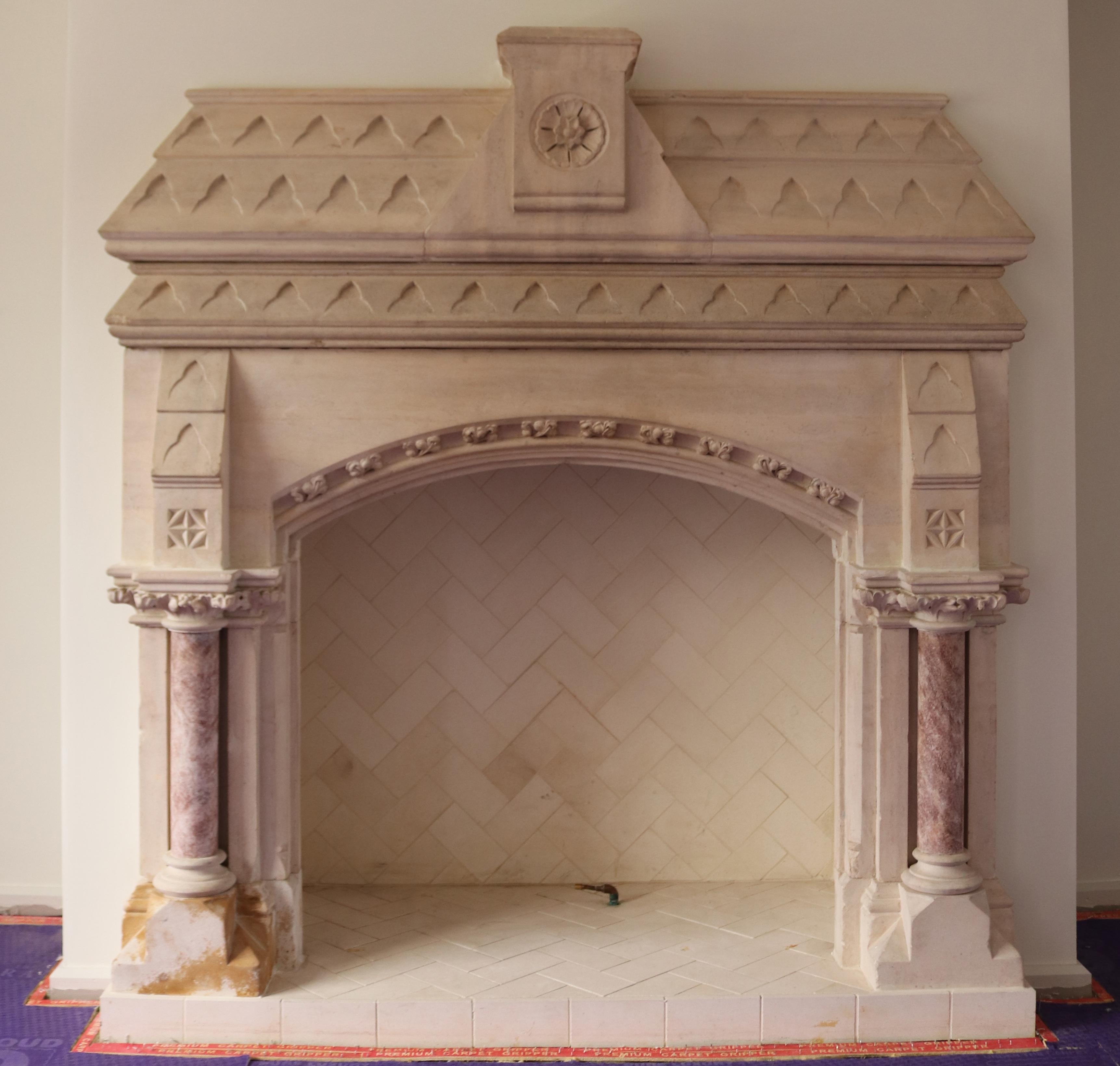 A mid-19th century English, Gothic Revival fireplace. This fireplace bears similarities with two
surrounds supplied to Presentation Convent, Co. Waterford, designed by Augustus Pugin and
completed by his son Edward Pugin.

Carved from Caen