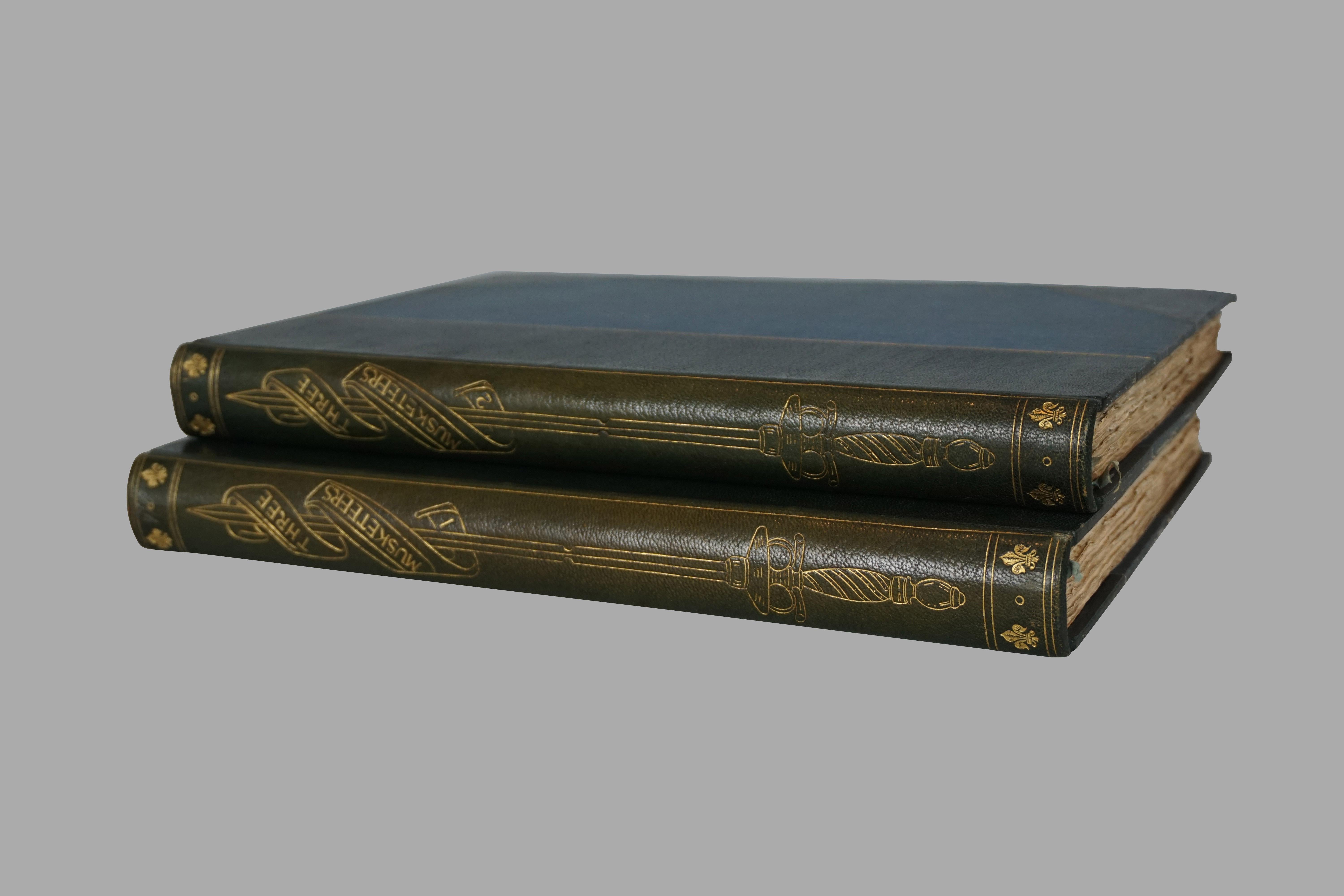 A rare and attractive 2 volume oversized deluxe edition of Alexander Dumas' famous work, The Three Musketeers, limited to 750 copies of which this example is number 615. Bound in 3/4 blue leather with decorated end papers, published in London in