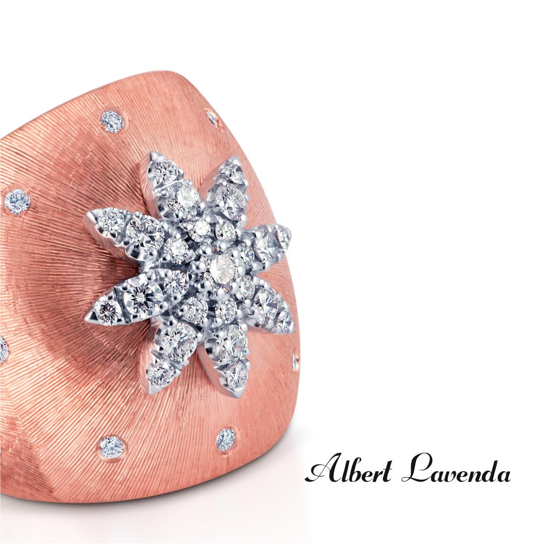 Diamond set 18K rose gold statement ring in matte finish. Centering a mind blowing layout of flowers with 8 petals created with diamonds and surrounding it is a scatter of diamonds for an added special touch. Limited edition designed by Albert