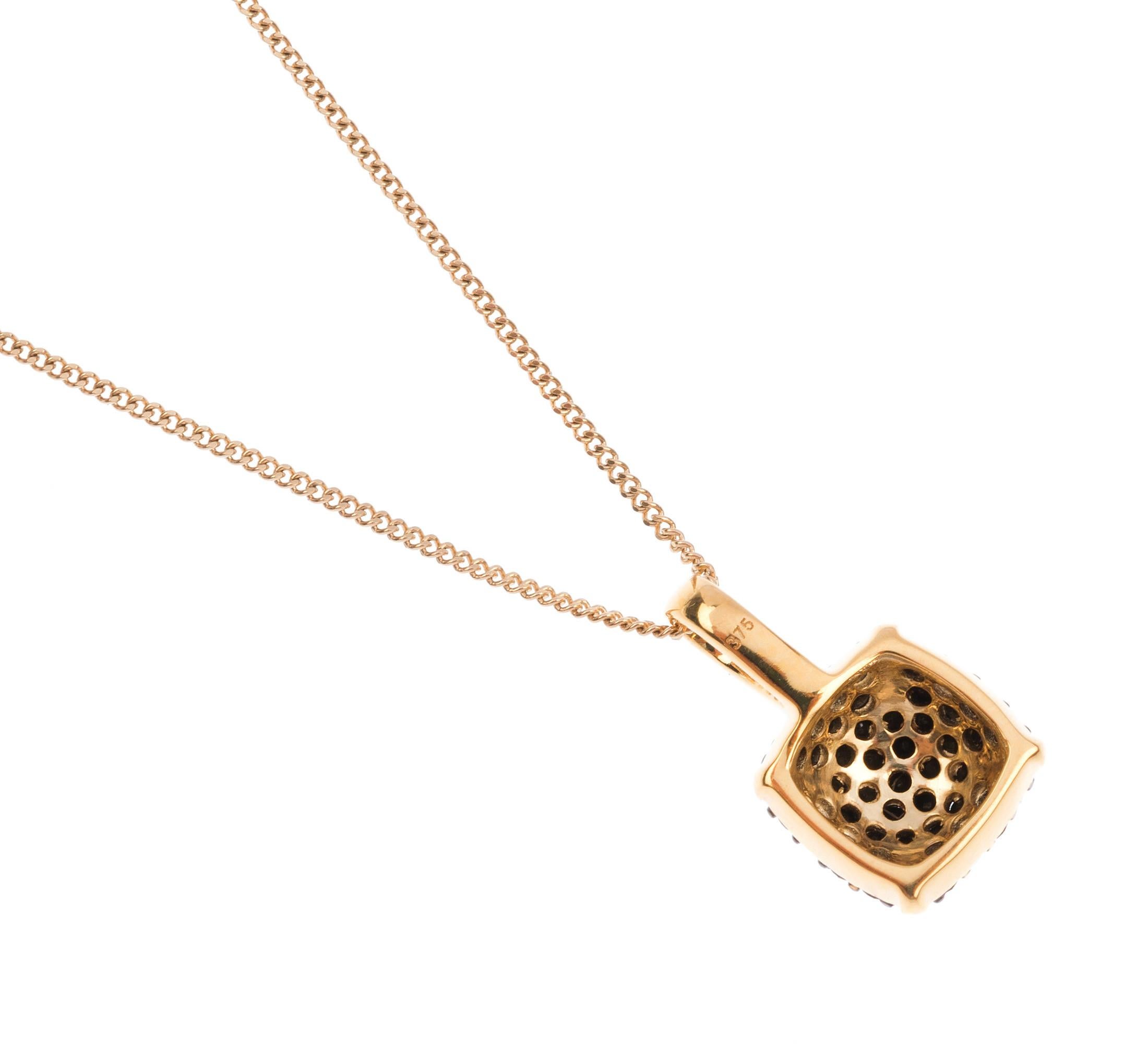 A fabulous limited edition Pendant, each designed as a cluster of black spinels, sittings beautifully within the yellow gold setting.

The trendy combination of black and gold creates, an elegant and fashion-forward finish... that is simply perfect