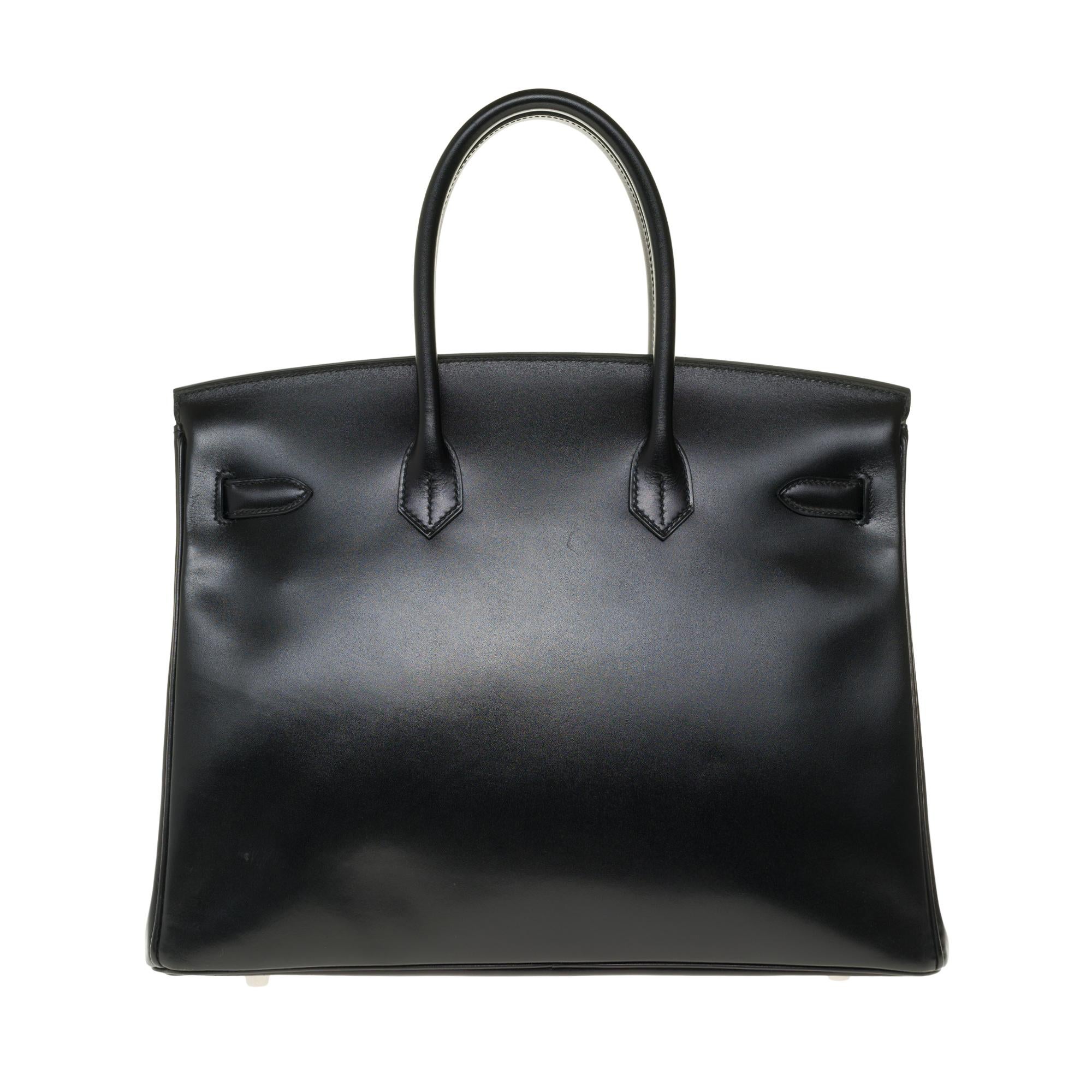 COLLECTIBLE PIECE / VERY COVETED
LIMITED EDITION BLACK CALF BOX LEATHER BIRKIN 35, GUILLOCHÉ PALLADIUM HARDWARE

We love this stunning and limited edition Hermès Birkin 35 Guilloche Black. This bag is crafted with box leather and palladium hardware