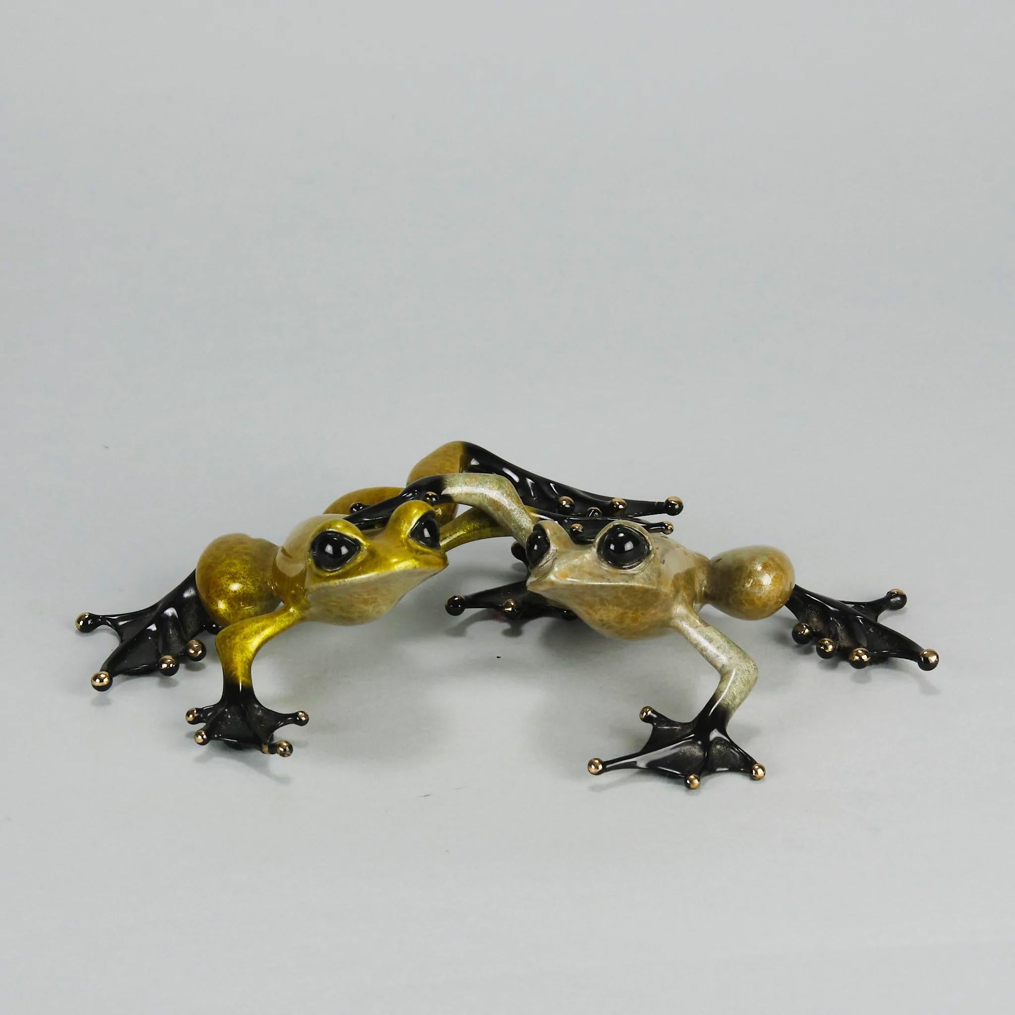 A wonderful limited edition artist proof bronze group study of two frogs cuddled together exhibiting very fine colours and excellent tactile smooth lacquered surface, signed Tim, stamped 'Frogman' and numbered AP 91/100 

Additional