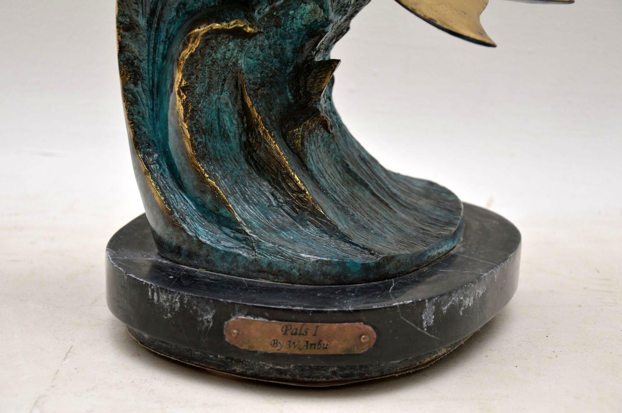 A stunning and highly collectable midcentury bronze sculpture by William Aribu, made in America in the mid-late 20th century. This is titles ‘Pals 1’ is signed by the artist and numbered 005/300. The bronze is finished in blue and gold, this is