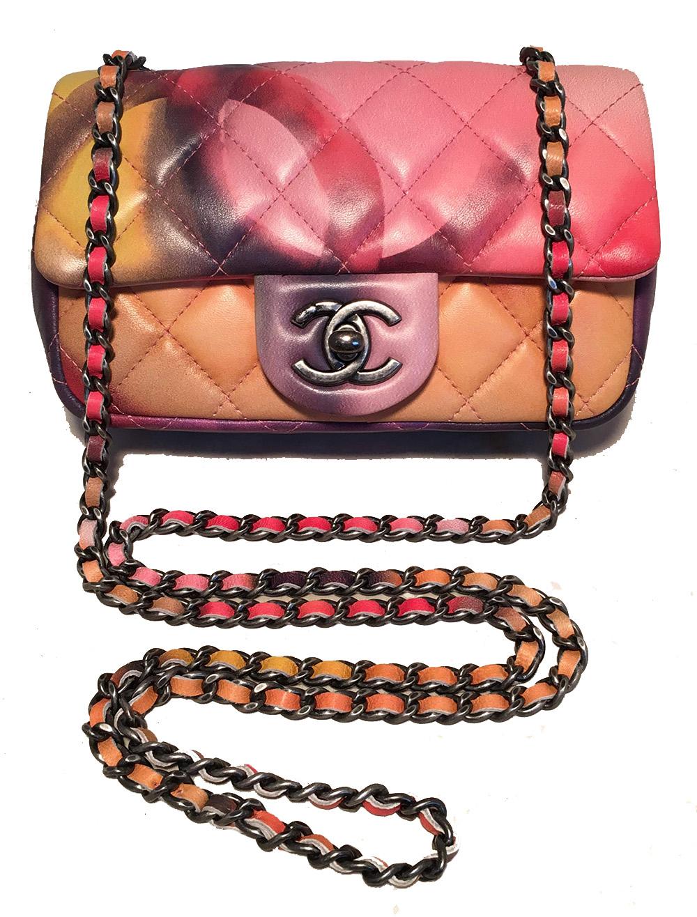 LIMITED EDITION Chanel Flower Power Classic Flap Shoulder Bag in excellent condition. Quilted multicolor lambskin leather in pinks, peach, purples and yellow with CC logo spray paint style print on top flap. Gunmetal hardware and signature woven