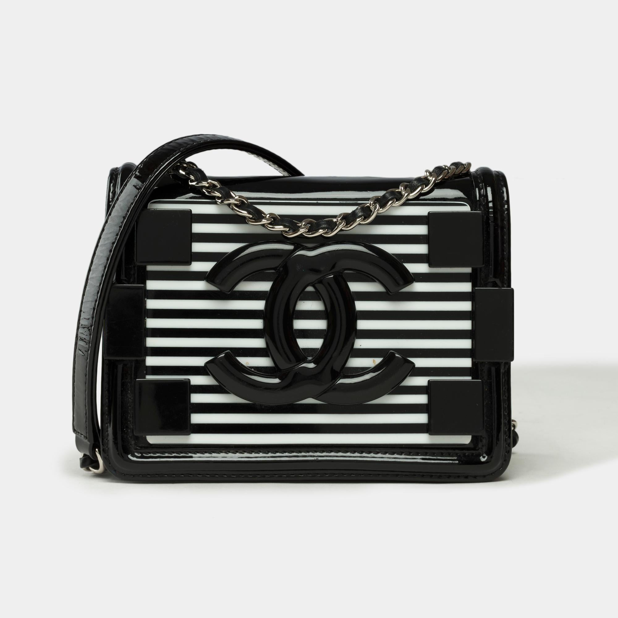 Stunning​ ​&​ ​Rare​ ​Chanel​ ​limited​ ​edition​ ​Lego​ ​mini​ ​brick​ ​shoulder​ ​bag​ ​in​ ​black​ ​quilted​ ​patent​ ​leather​ ​with​ ​black/white​ ​plexiglas​ ​plates​ ​on​ ​the​ ​front,​ ​silver​ ​metal​ ​shoulder​ ​strap​ ​interlaced​ ​with​