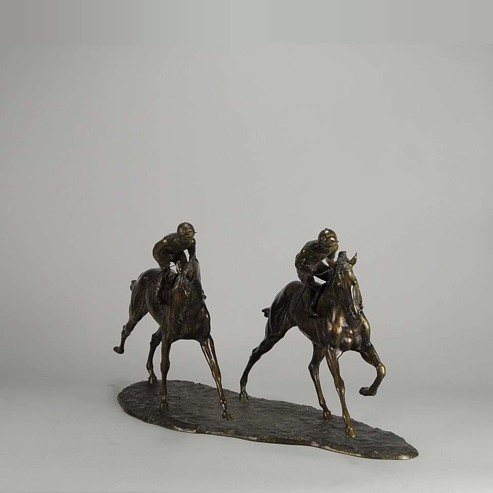 An exciting limited edition bronze study of two racehorses with jockeys up, the surface of the bronze with fine variegated green and brown patina and excellent hand chased surface detail. Signed Knight dated 1999 and numbered 7/9

In this bronze