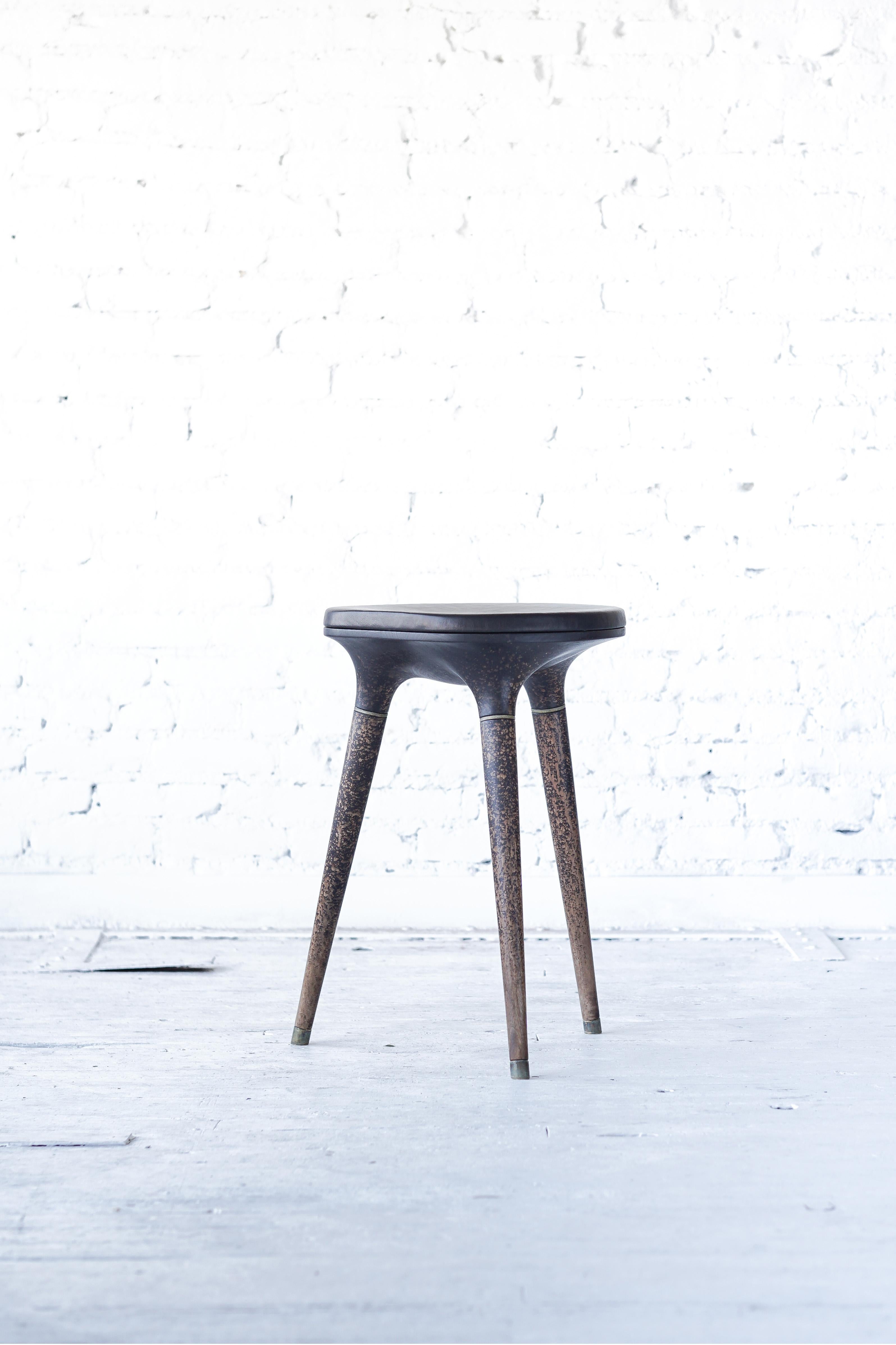 Limited edition custom Ombre finish stool 001 from Series 001 by Vincent Pocsik.

Carved walnut stool with leather cushion top and brass accents. Shown here at counter height. 

Vincent Pocsik finds the balance between old and new fabrication