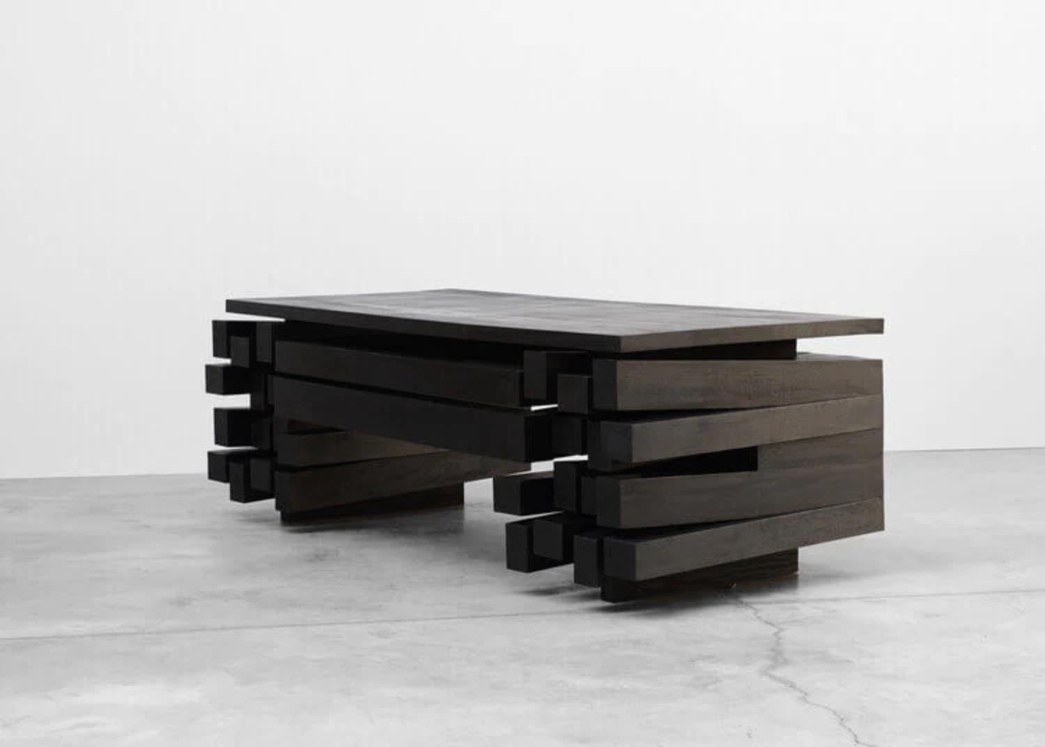 Desk in Iroko Wood by Arno Declercq
Limited Edition of 12 pieces.
Materials: Burned and waxed Iroko wood.
Dimensions: W 233 x D 100 x H 75 cm


Arno Declercq
Belgian designer and art dealer who makes bespoke objects with passion for design,