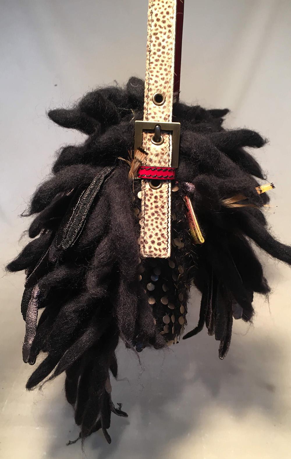 Limited Edition Fendi for Neiman Marcus Dreadlock Bird Baguette in excellent condition. To commemorate Neimans 100 year anniversary, Fendi produced 44 of these limited edition pieces. Each piece was handmade by the Fendi craftsmans and features a