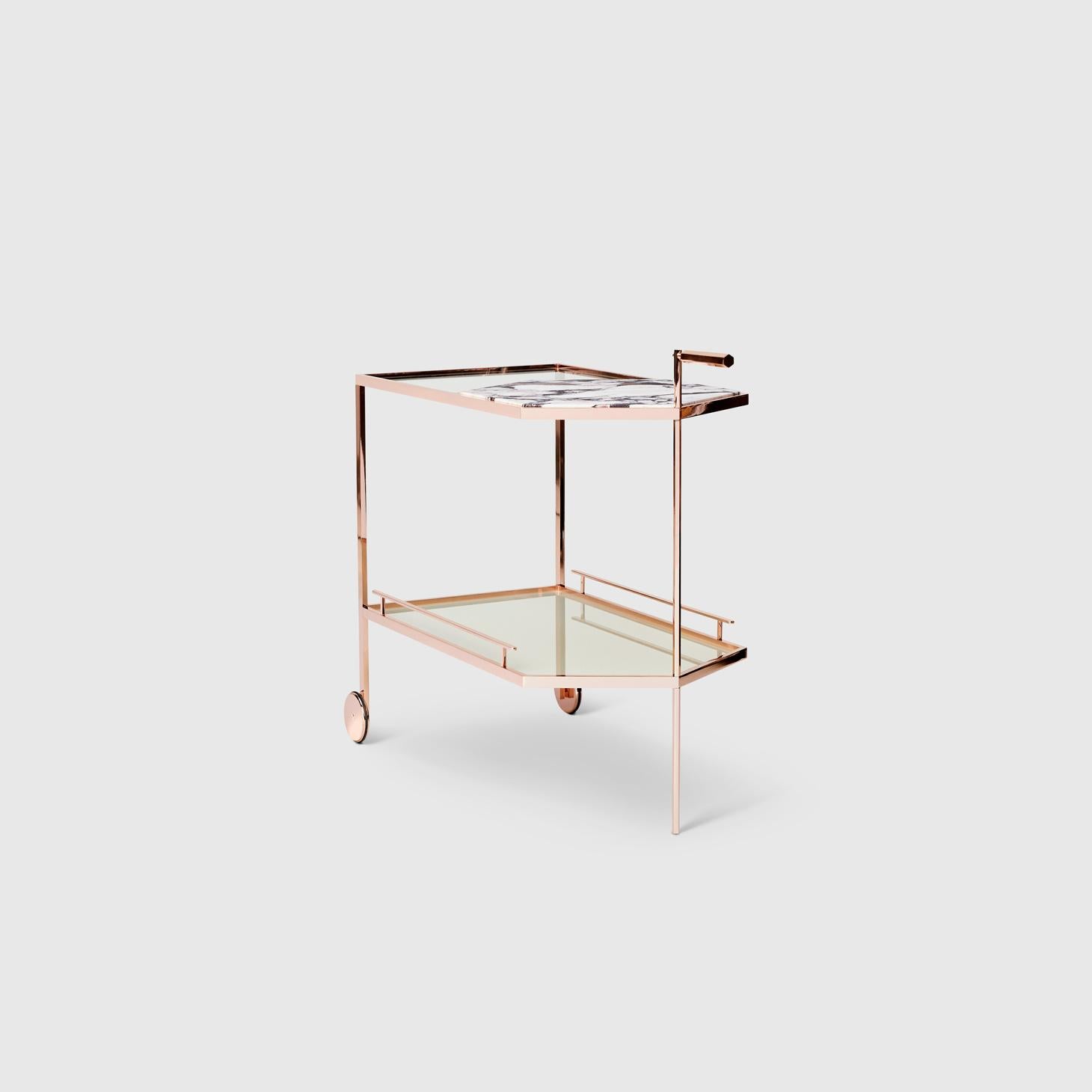 The Gin Lane bar cart by Yabu Pushelberg has a minimal profile that takes precision craftsmanship by experts in Italy and creates a statement without shouting. 

The rose copper with calacatta viola marble is a Limited Edition of 10. 

It is
