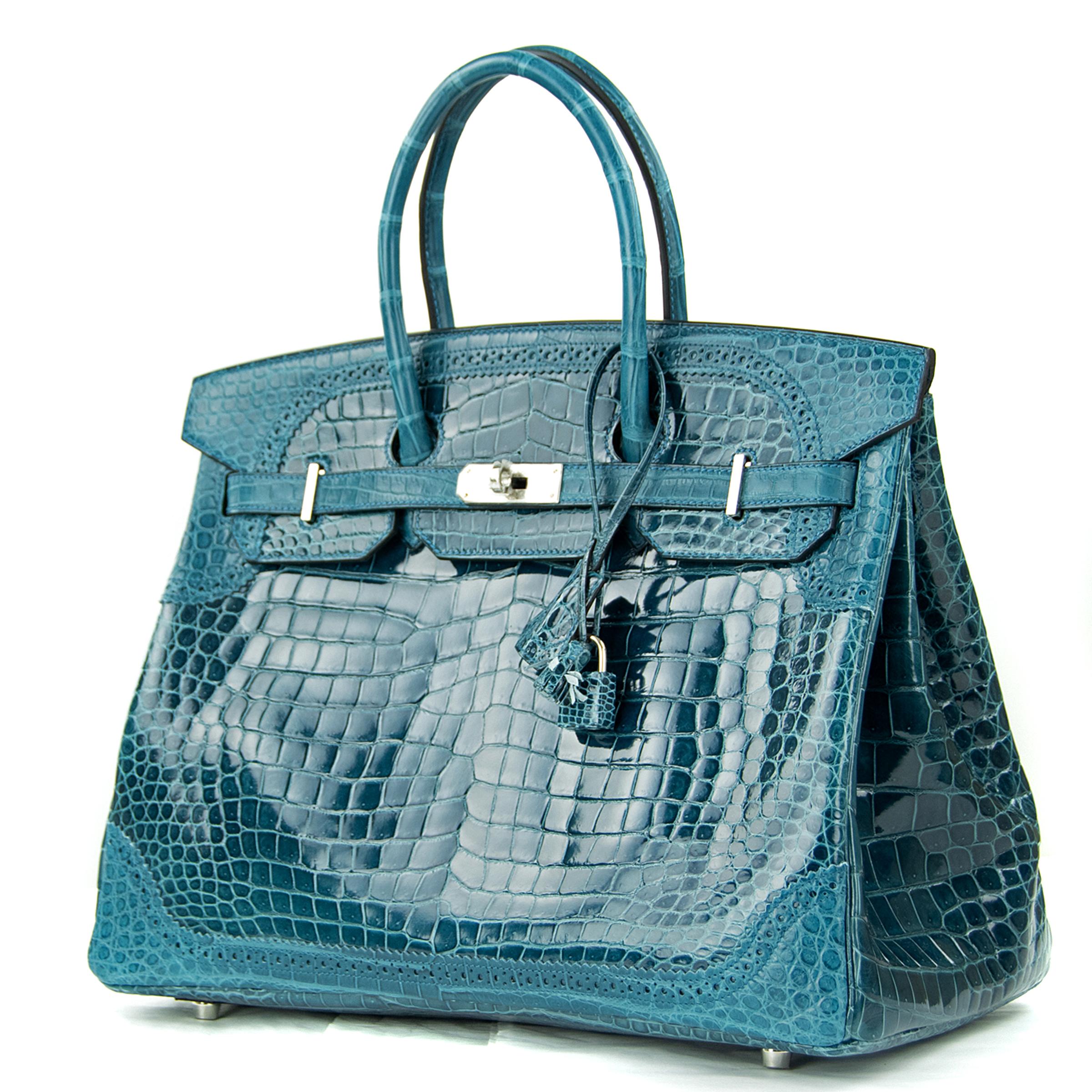 Limited Edition Hermes Porosus Crocodile 35cm Ghillies Birkin in Shiny and Matte Bleu Colvert. This iconic special order Hermes Birkin bag is timeless and chic. Fresh and crisp with palladium hardware.  

    Condition: New or Never Used
    Made in