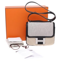 LIMITED EDITION Hermes Constance shoulder bag in bi-material:canvas&leather, PHW