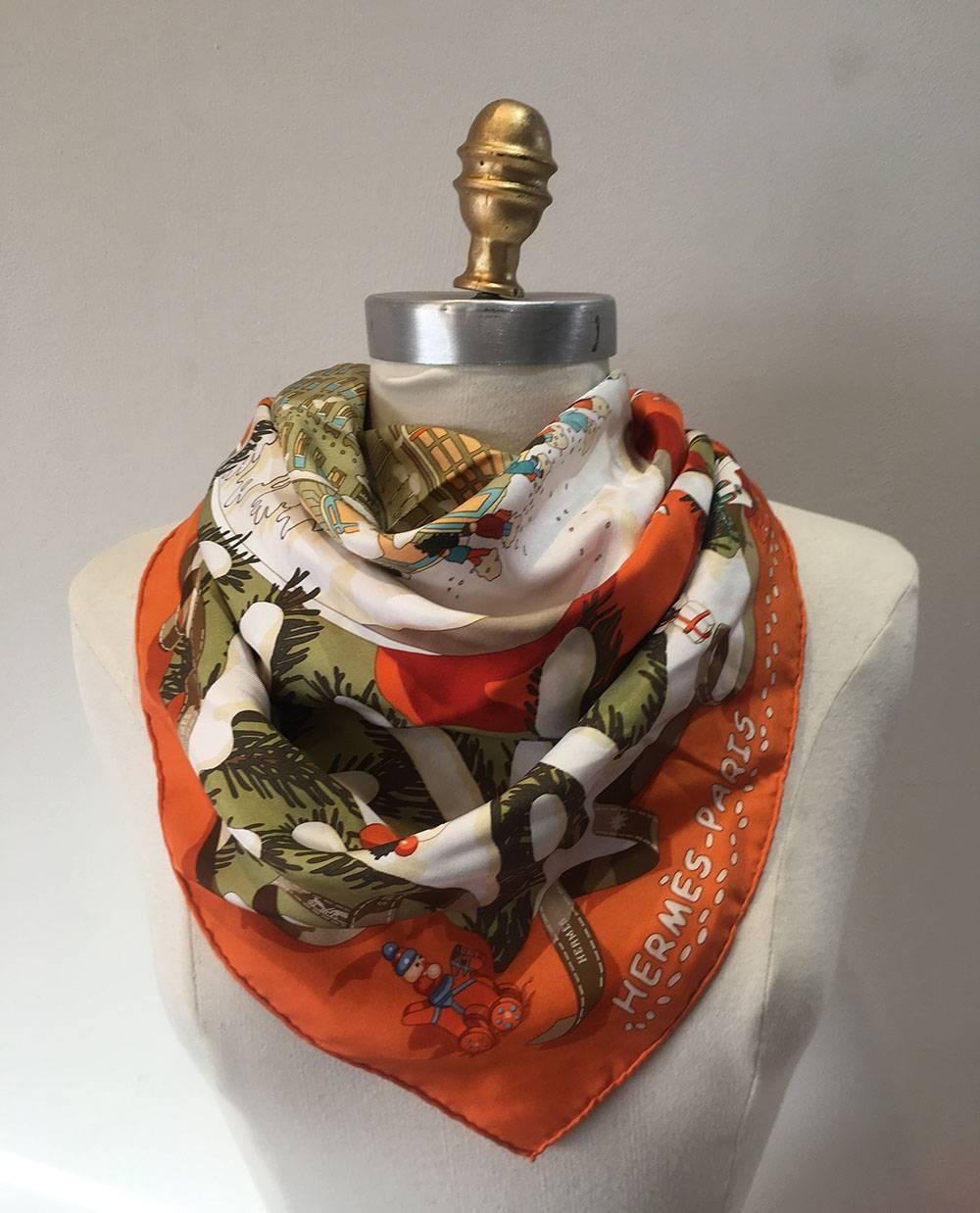GORGEOUS Hermes limited edition noel au 24 Faubourg silk scarf in excellent condition.  Original silk screen design c2004 by Dimitri Rybaltchenko features a festive snowy depiction of the original Hermes storefront inside a snow globe surrounded by