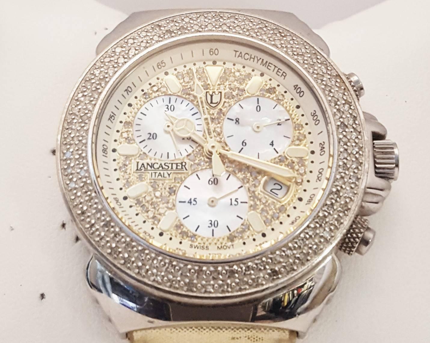 Limited Edition beauty purchased at Bevilacqua Gioielli in Venice, Italy.  This Lancaster stainless steel chronograph features a mother of pearl diamond dial and diamond bezel.  Total weight of diamond is 1.75 carats.  Water resistant to 5 ATM,