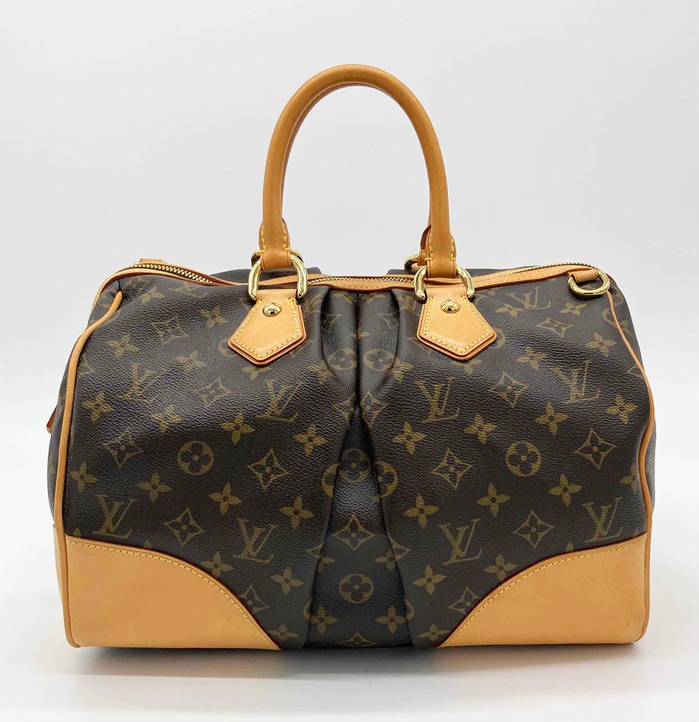 Limited Edition Louis Vuitton Monogram Stephen Bag in very good condition. Monogram canvas exterior trimmed with tan leather. Original large pleated speedy style design created by Stephen Sprouse for the 2006 fall/winter runway collection. Unique