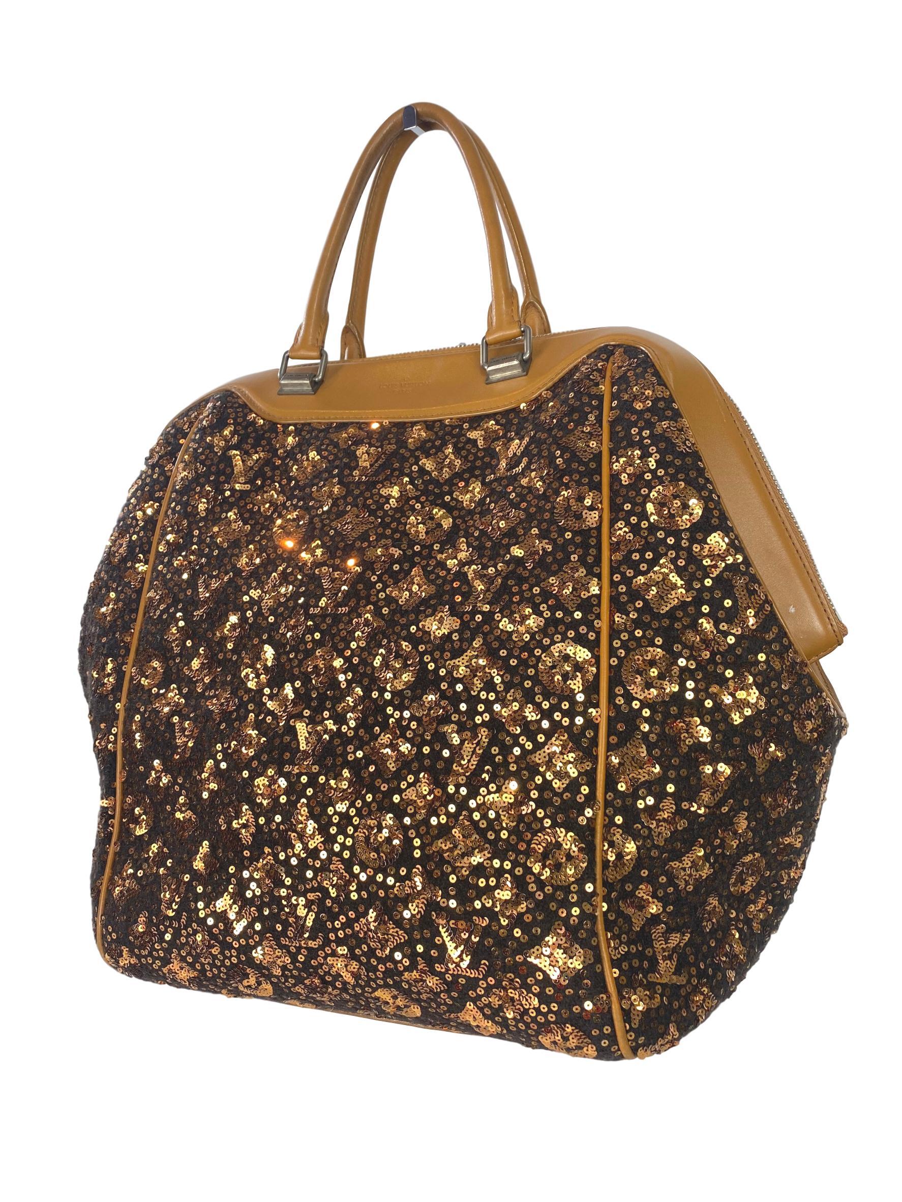 Louis Vuitton North South Sunshine Express Sequin Bag, Limited Edition 2012-2013. The entirety of this Louis Vuitton speedy is covered in a beautiful sequin monogram embellishment with double rolled top vachetta handles and trim in classic tan Louis