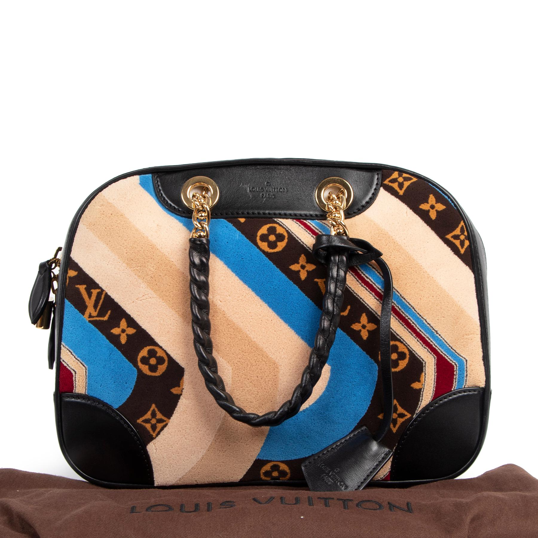 Everyone loves a good Louis Vuitton classic but every once in a while it can be fun to stand out from the crowd. This incredible Limited Edition Vanity Tuffetage Bowling bag is truly a unique and rare piece that will make everyone envy you! This bag