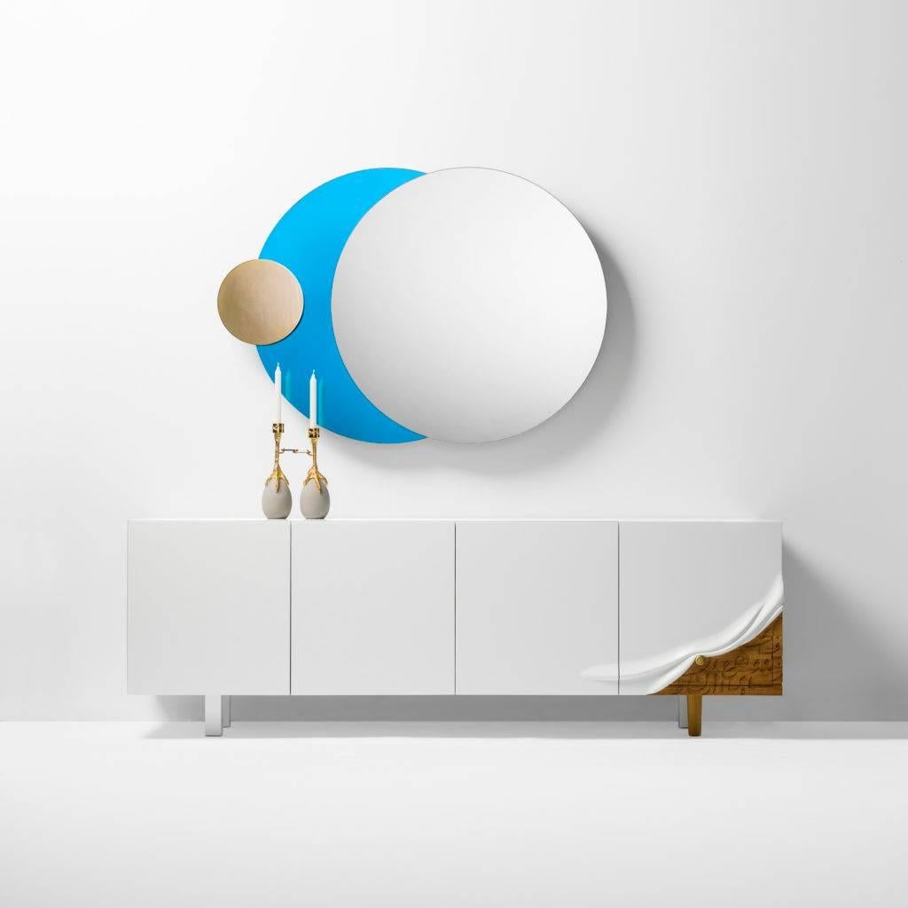 Limited Edition Lunar Tale mirror by Loulwa Al Radwan for BD Art Editions.
 
Lunar Tale mirror
Design by Loulwa Al Radwan.
 
Limited Edition of eight units + two artist proofs + two prototypes.

Blue and grey mirrors and an gold plated