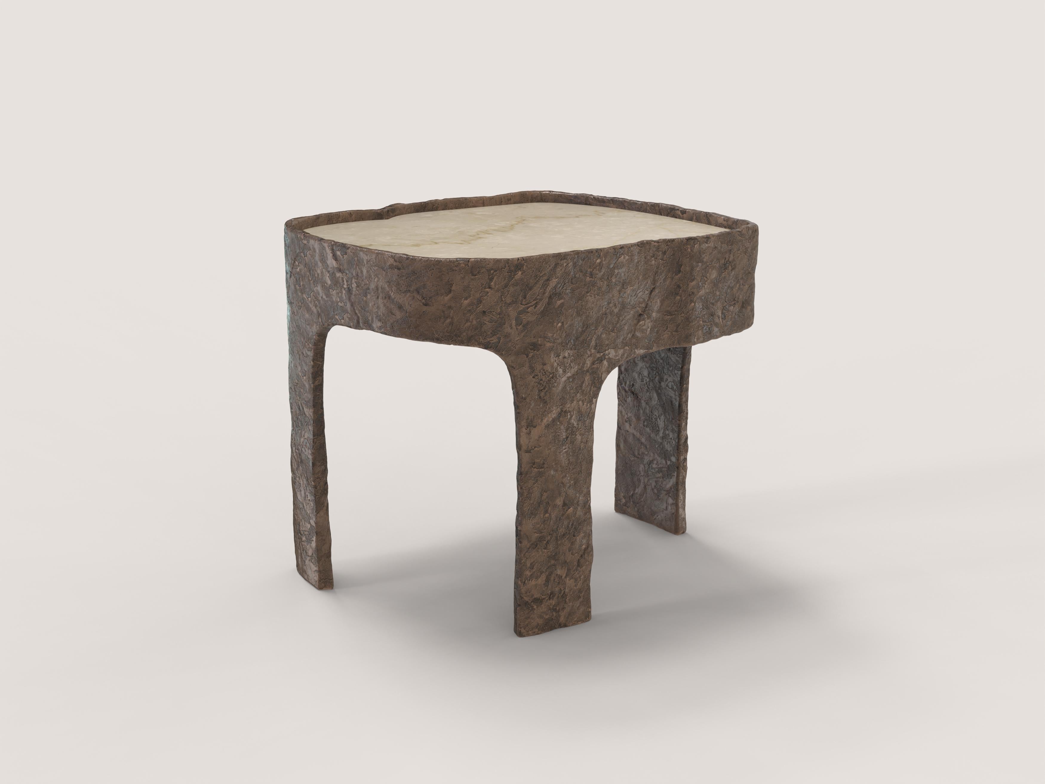 Sumatra V1 is a 21st century side table made by Italian artisans in cast bronze with light brown patina with an extraordinary Botticino Classico marble plane. It is part of the collectible design language Sumatra that has been developed by the
