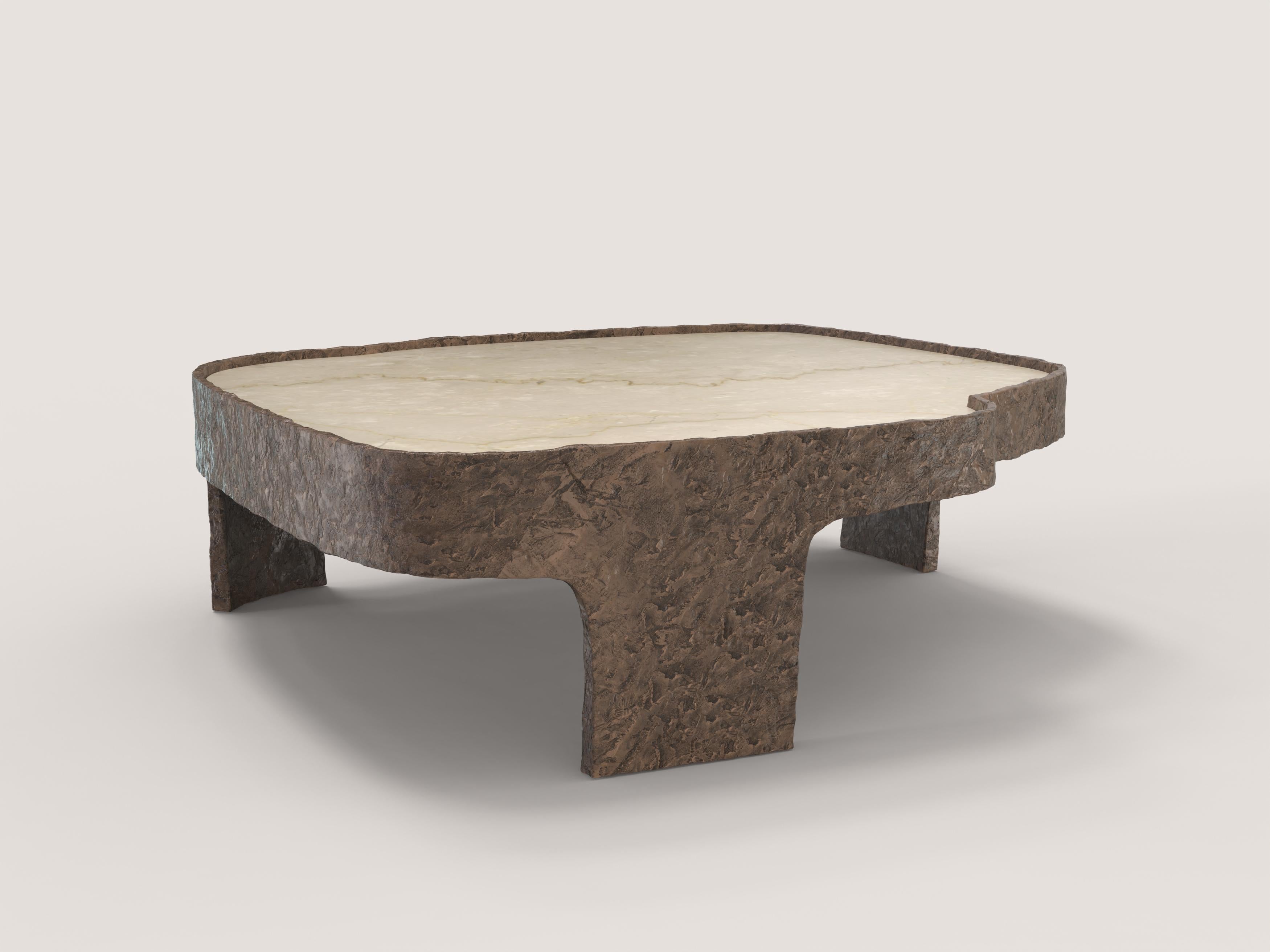 Sumatra V2 is a 21st century side table made by Italian artisans in cast bronze with light brown patina with an extraordinary Botticino Classico marble plane. It is part of the collectible design language Sumatra that has been developed by the