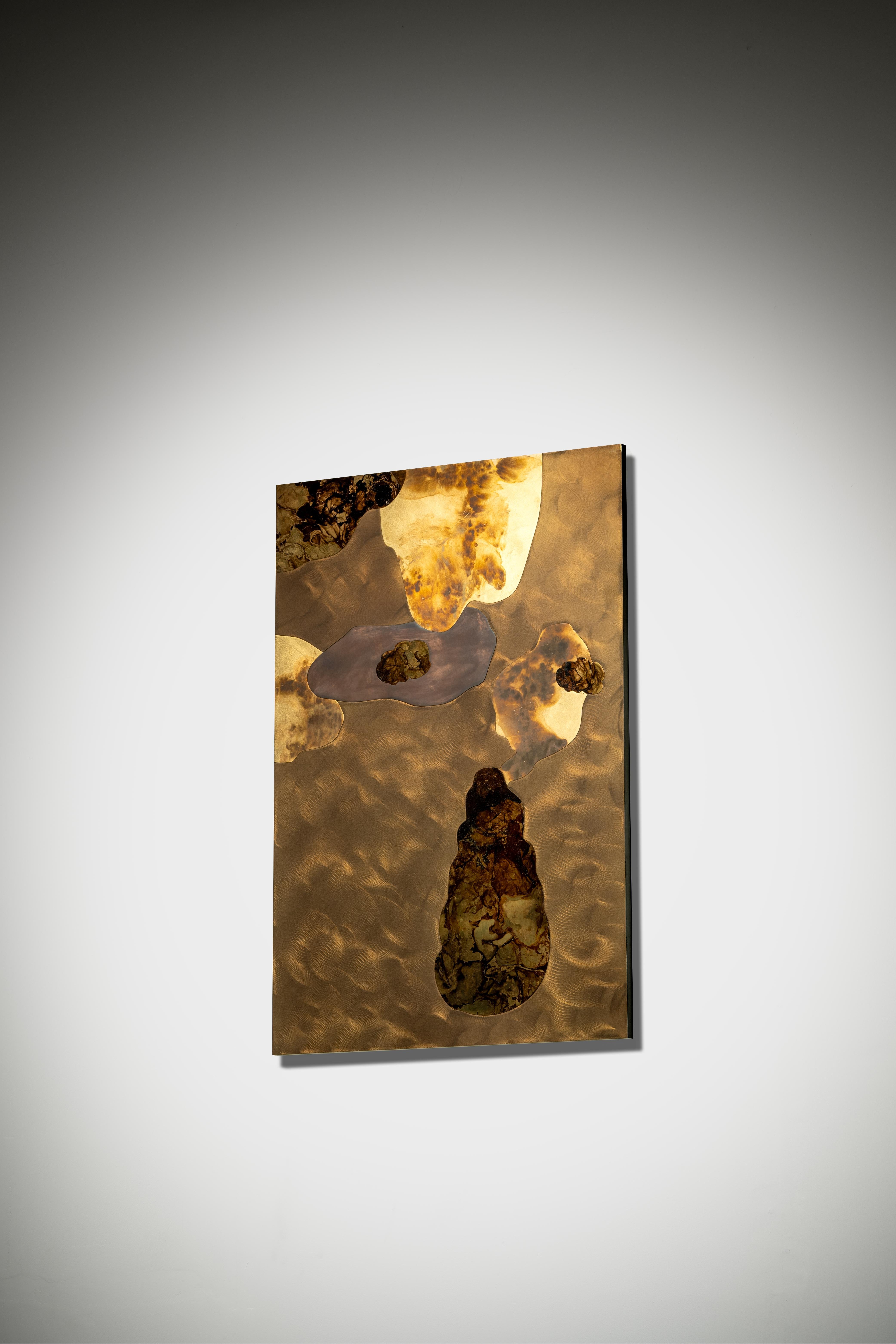 Wandering nebula in endless seas of gold dust with planetary forms making their way to unknown destinations. Art for your souls in precious metals and fine craftsmanship.
The wall art is made with meticulous marquetry of metal, hand lacquered to