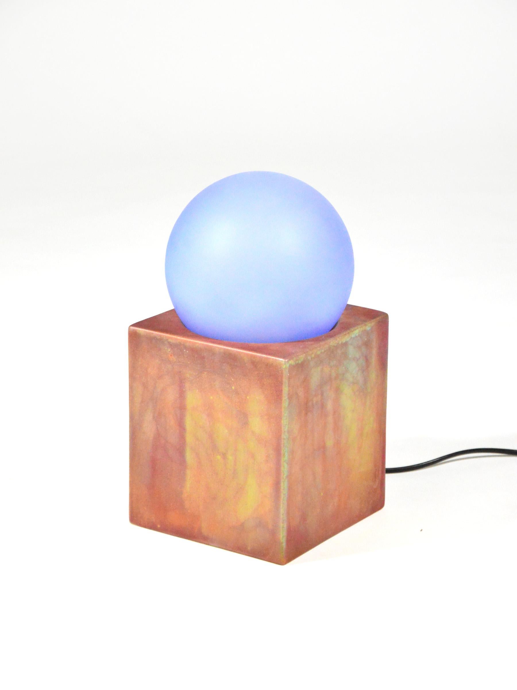 The 'Alba' lamp was designed by Ettore Sottsass for the electricity company Enel, this is a version made in only 100 signed and numbered pieces.
In contrast to the current production lamp, which has a glass base, this version has a ceramic base