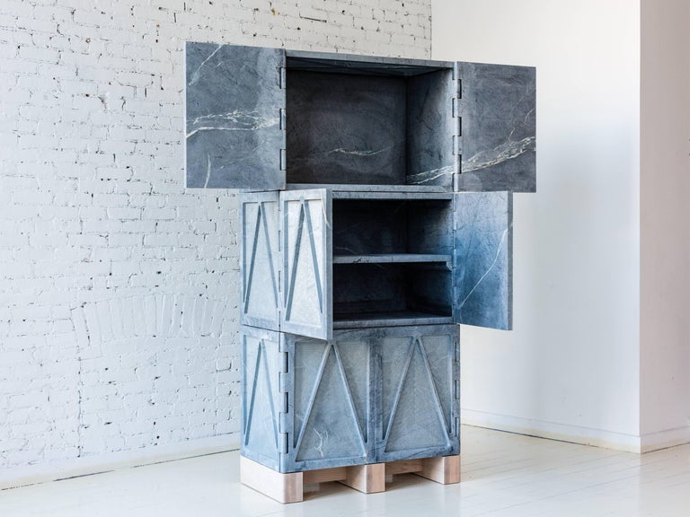 A part of Fort Standard’s collection, “Qualities of Material”, this stone cabinet has a triangular relief pattern milled into the exterior panels, which removes excess weight and allows the remaining ribs to retain the material’s strength. The