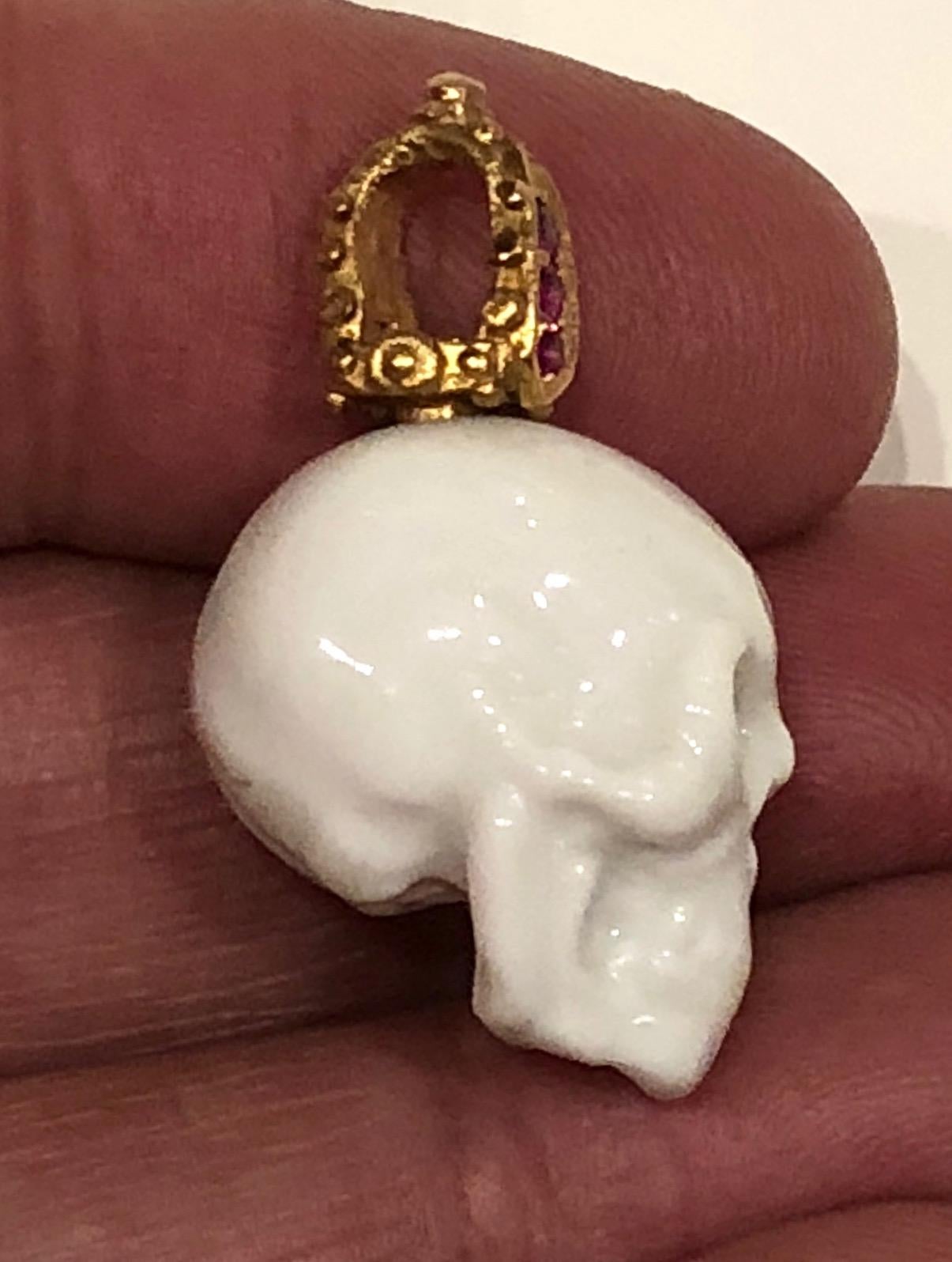 Modern Limited Edition Rosenthal Porcelain Skull Pendant with 18k gold and set Rubies