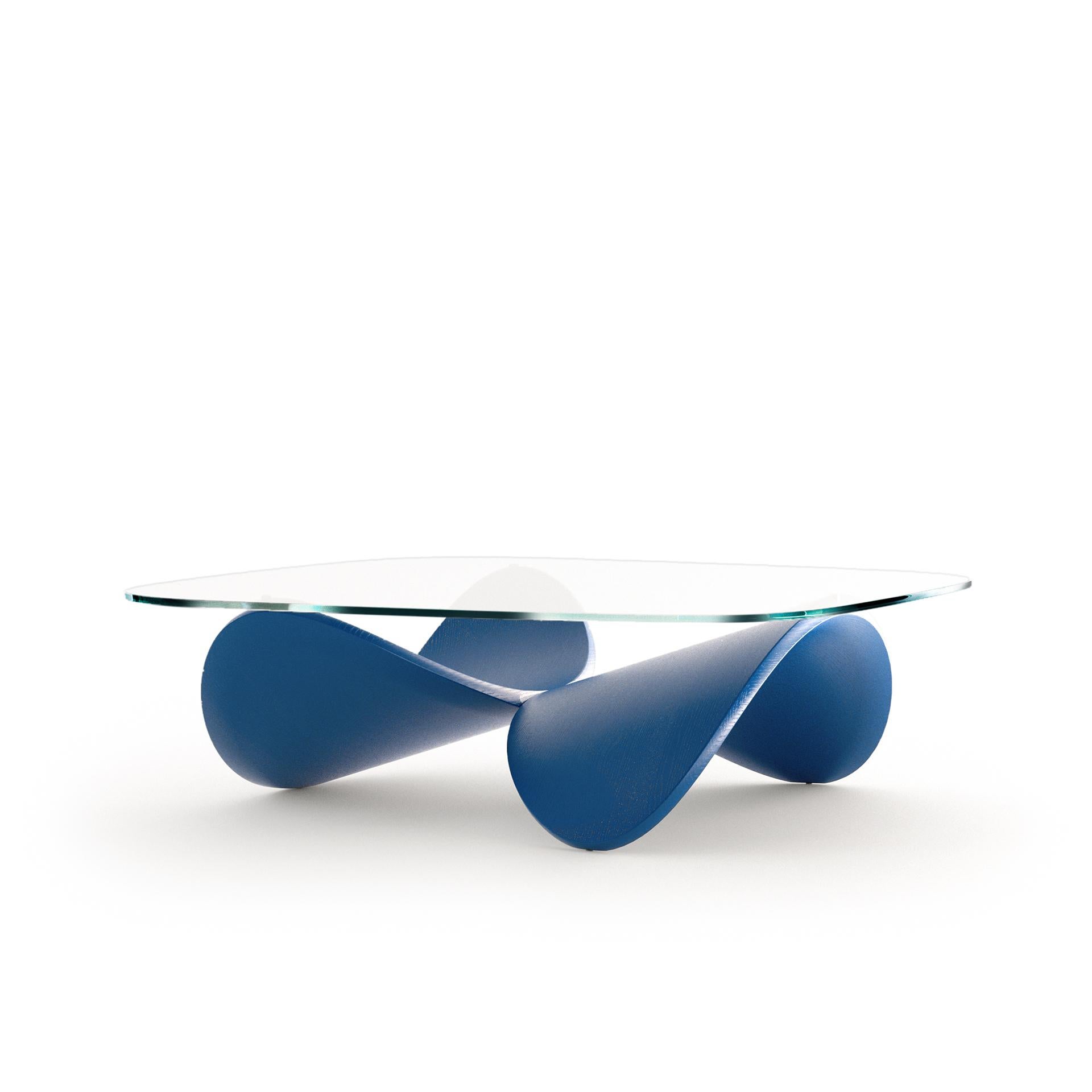 A limited edition coffee table made for living spaces that are looking to express uniqueness and a distinctive character. As a piece it is both furniture and sculpture. Once in a room, it expands the spacial quality of the interior by offering new